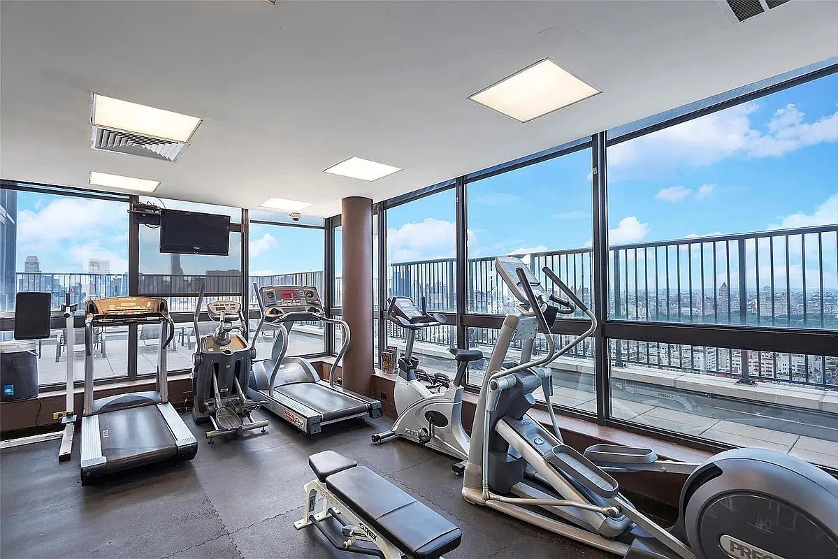 171 East 84th Street, Unit 4B Manhattan, NY 10028 - Photo 16 of 20 a view of a room with gym equipment