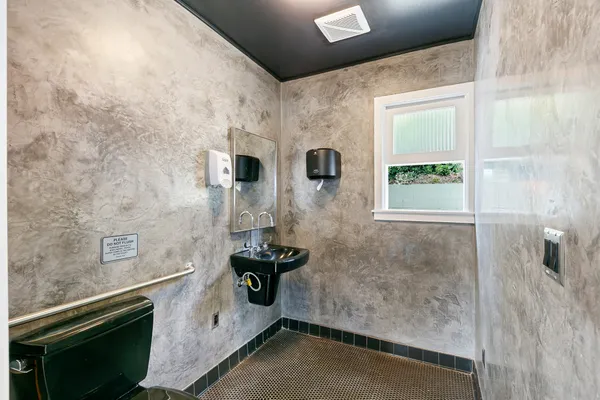 a bathroom with a sink and a shower