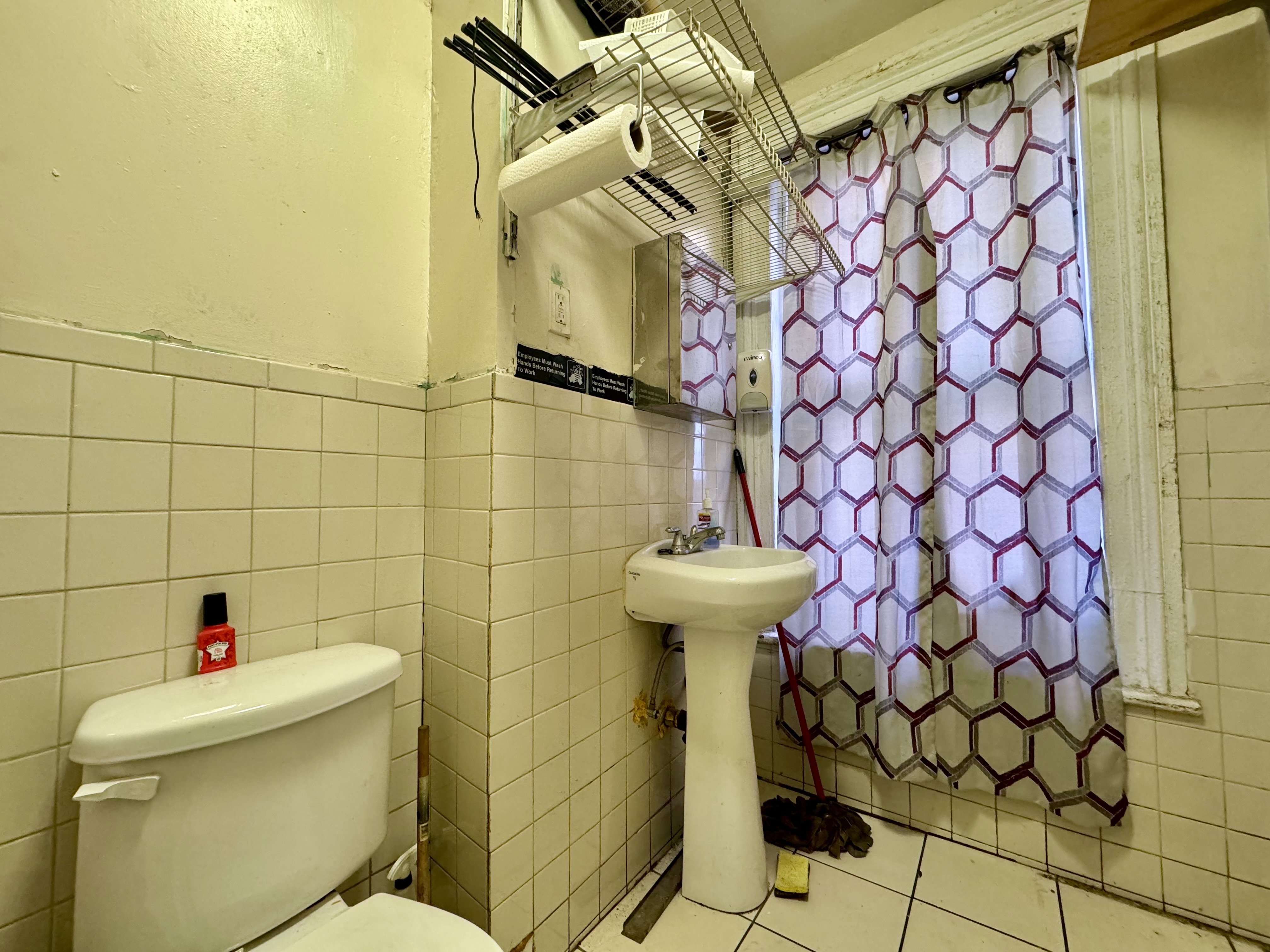 393 Classon Avenue, Unit CML1 Brooklyn, NY 11238 - Photo 8 of 8 a bathroom with a sink toilet and shower