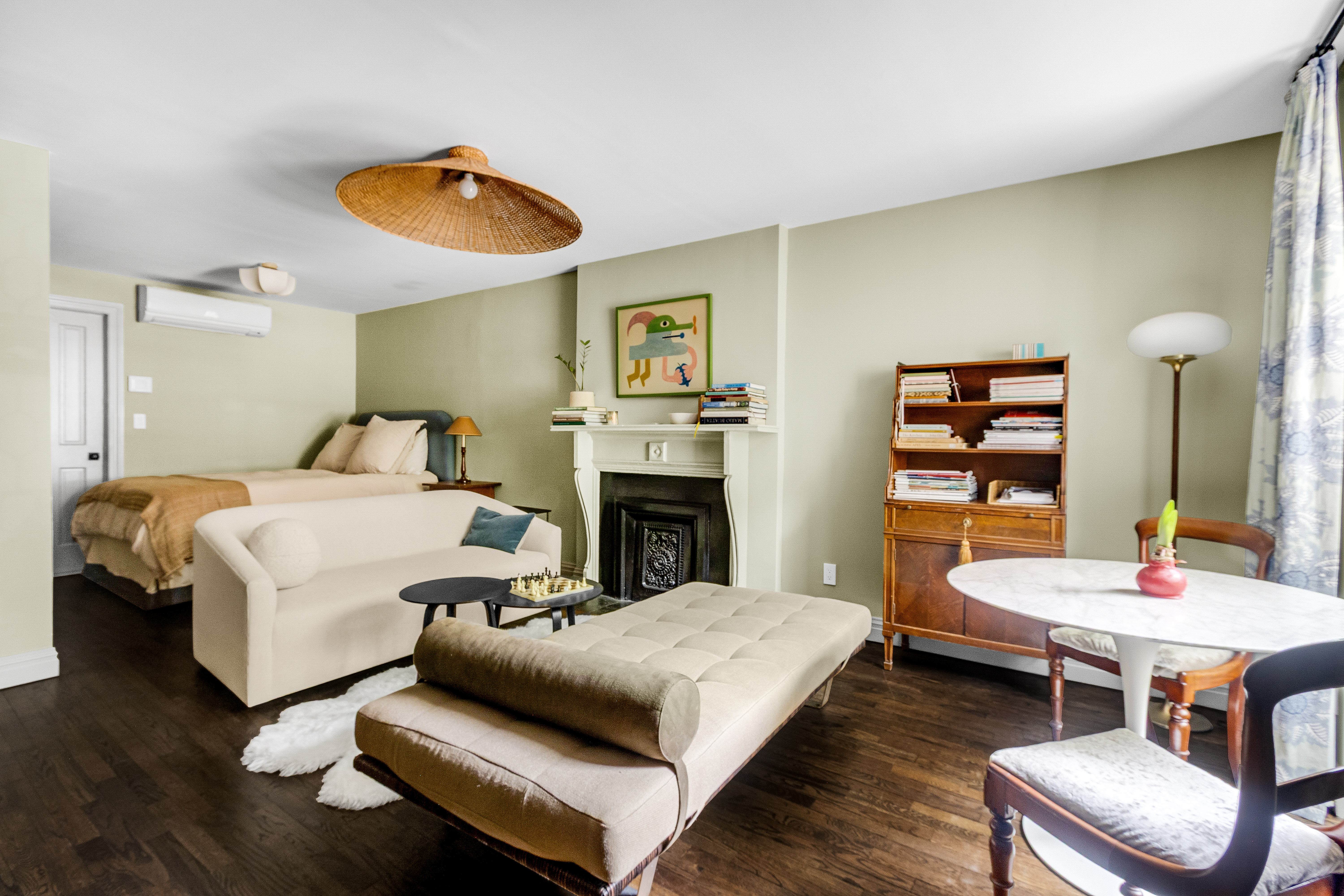 125 West 132nd Street Manhattan, NY 10027 - Photo 16 of 21 a bedroom with a bed and a couch