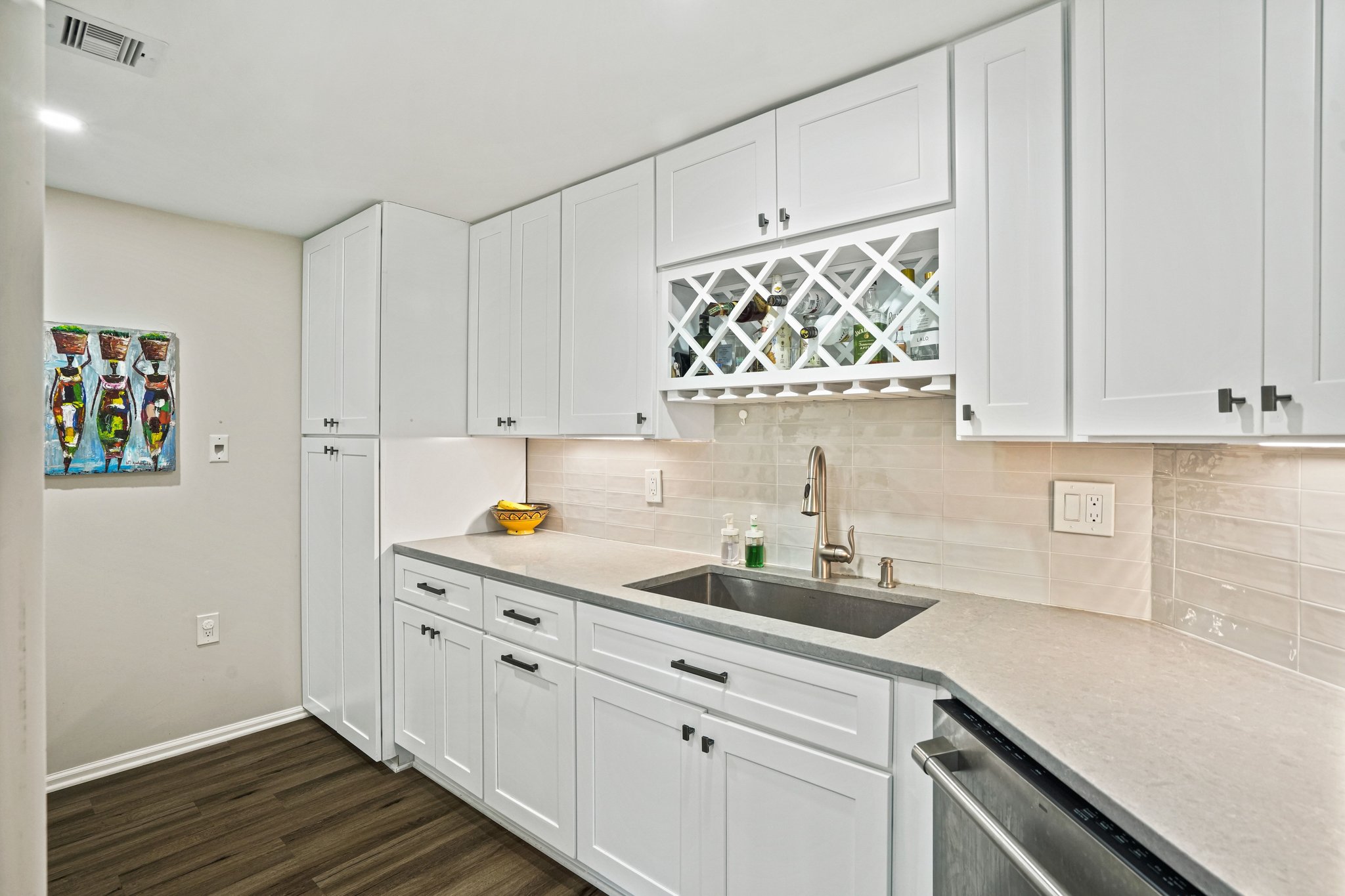 2725 Connecticut Avenue Northwest, Unit 507 Washington, DC 20008 - Photo 8 of 31 a kitchen with white cabinets and sink