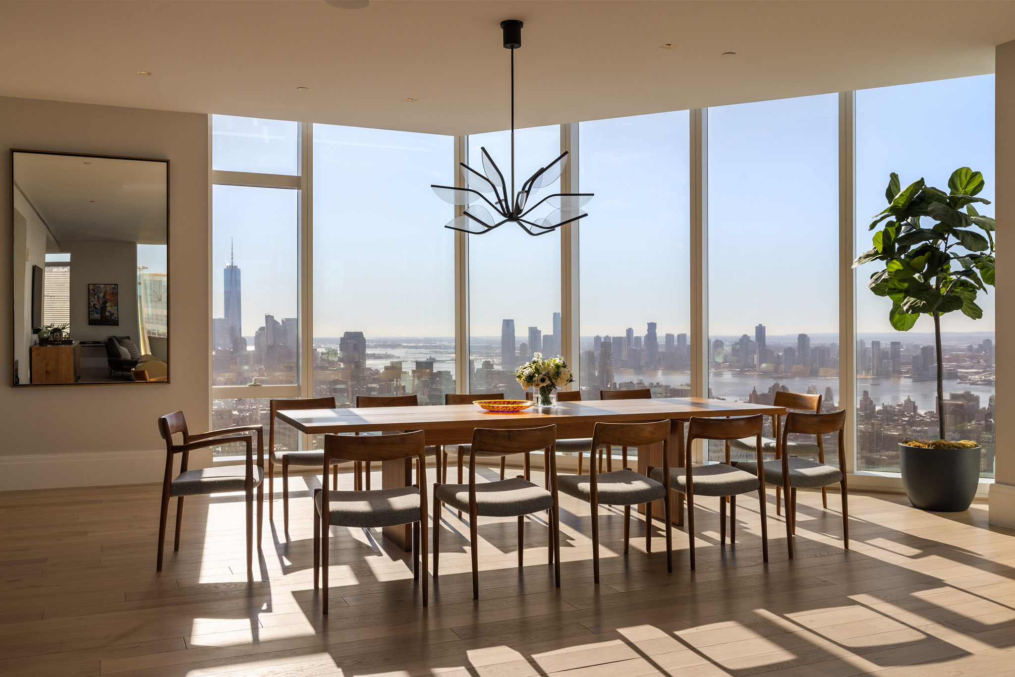 45 East 22nd Street, Unit 52/53B Manhattan, NY 10010 - Photo 5 of 27 a view of a dining room with furniture window and wooden floor