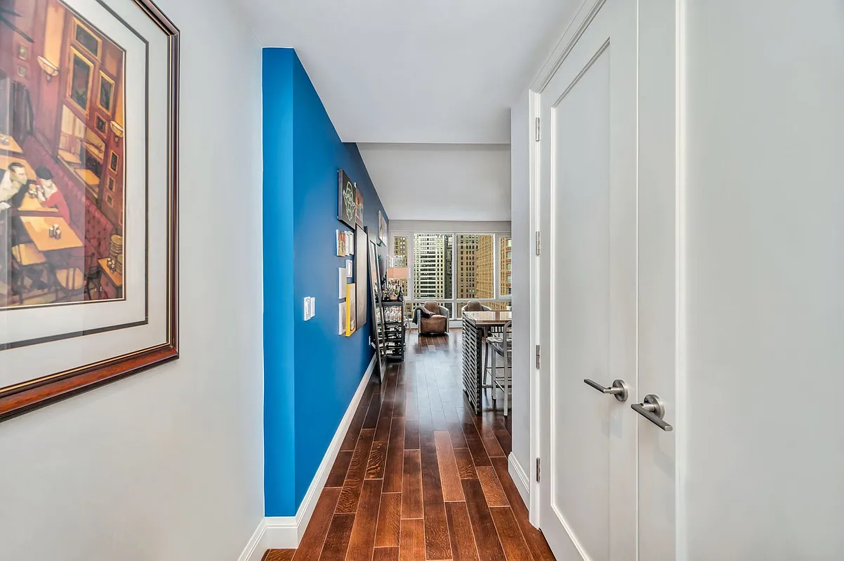70 Little West Street, Unit 15A Manhattan, NY 10004 - Photo 2 of 19 a view of a hallway with interior of the house