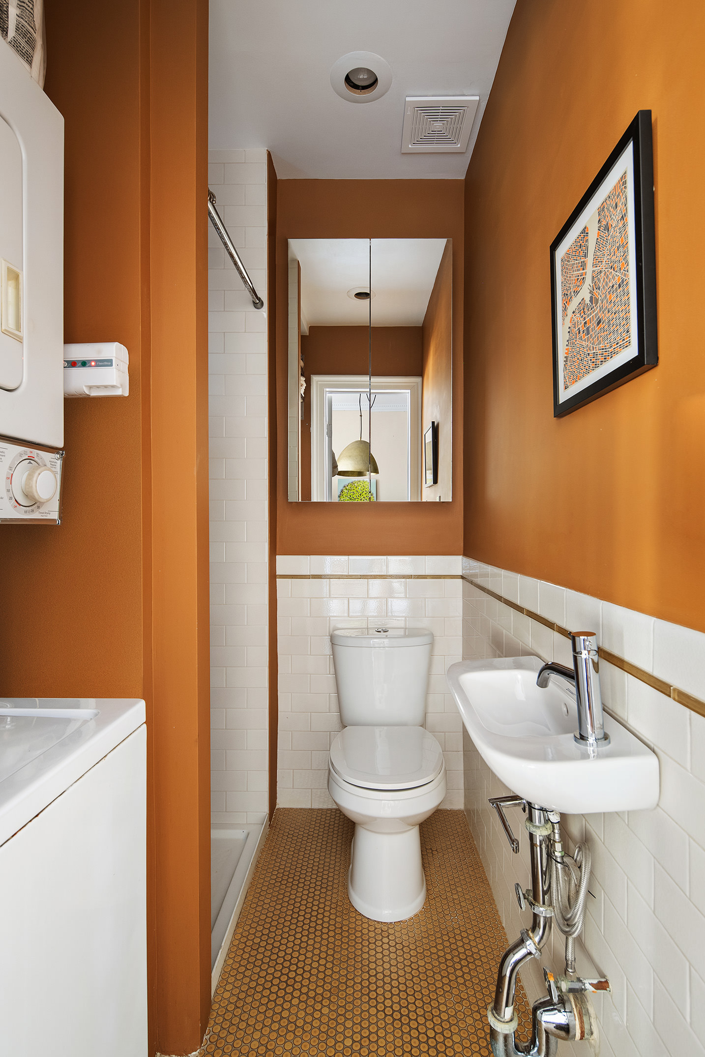 467 Pacific Street, Unit 10 Brooklyn, NY 11217 - Photo 7 of 10 a bathroom with a sink and a mirror
