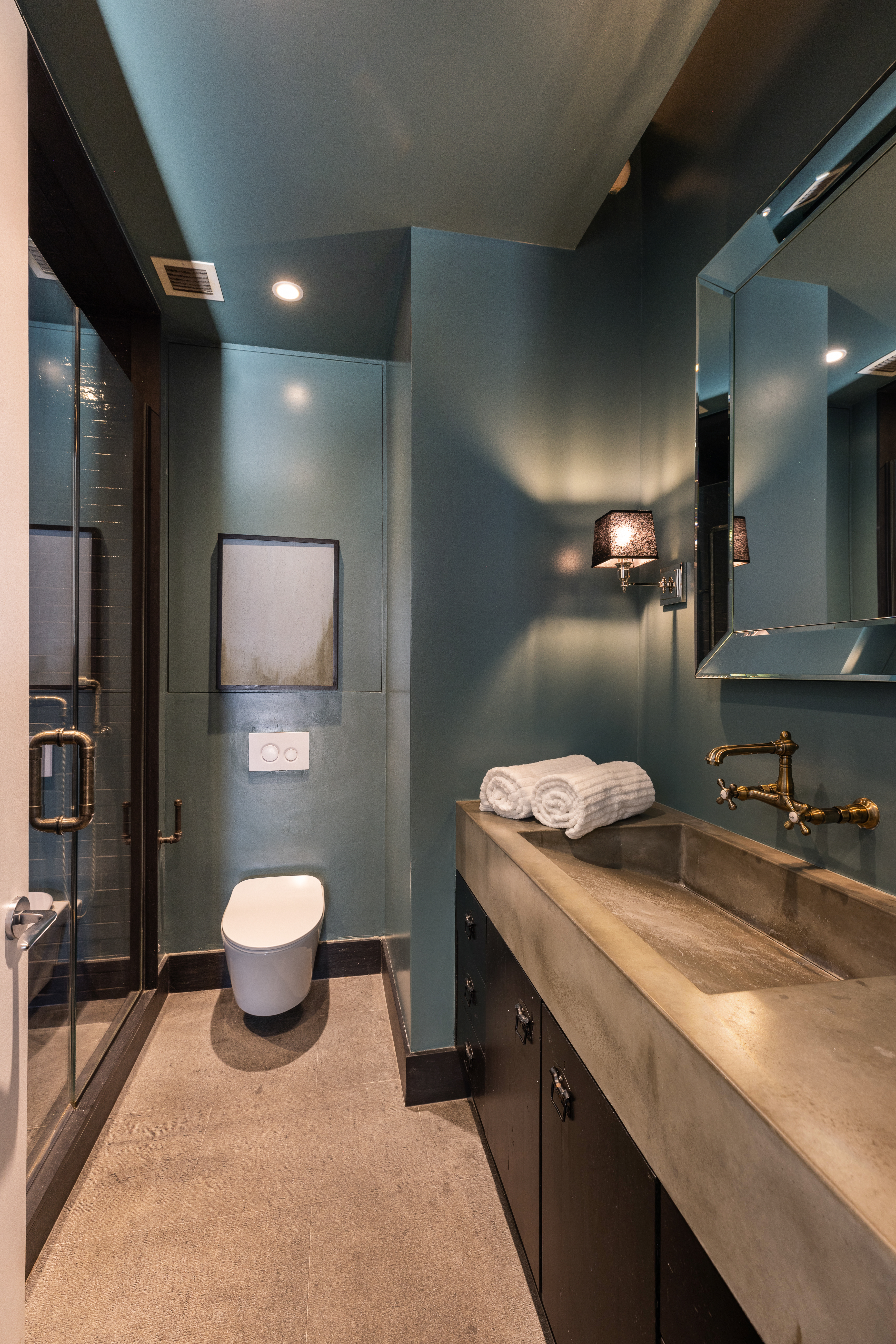 7 Bond Street, Unit PHAB Manhattan, NY 10012 - Photo 13 of 20 a bathroom with a sink a toilet and mirror