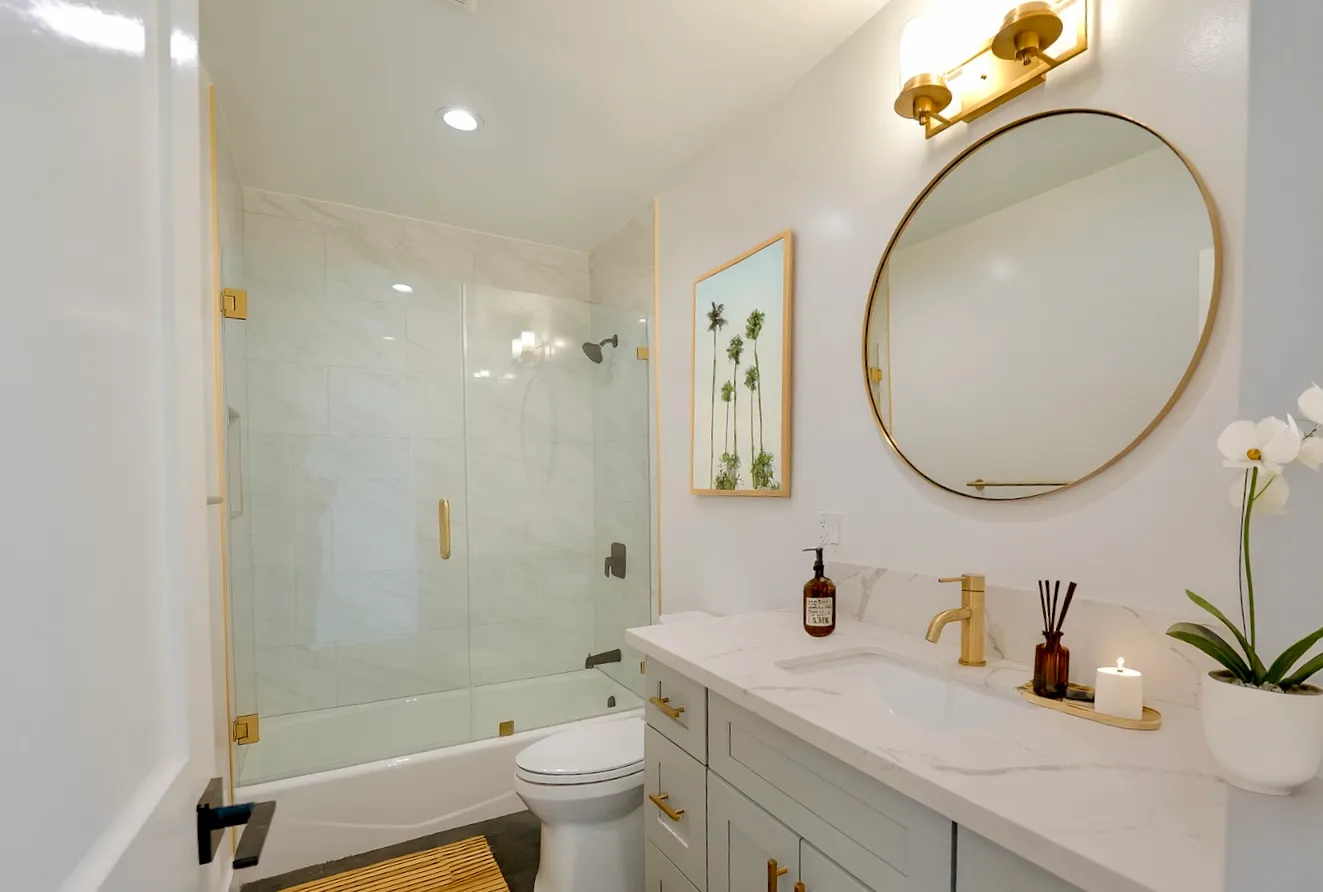 a spacious bedroom with a bed and a large window