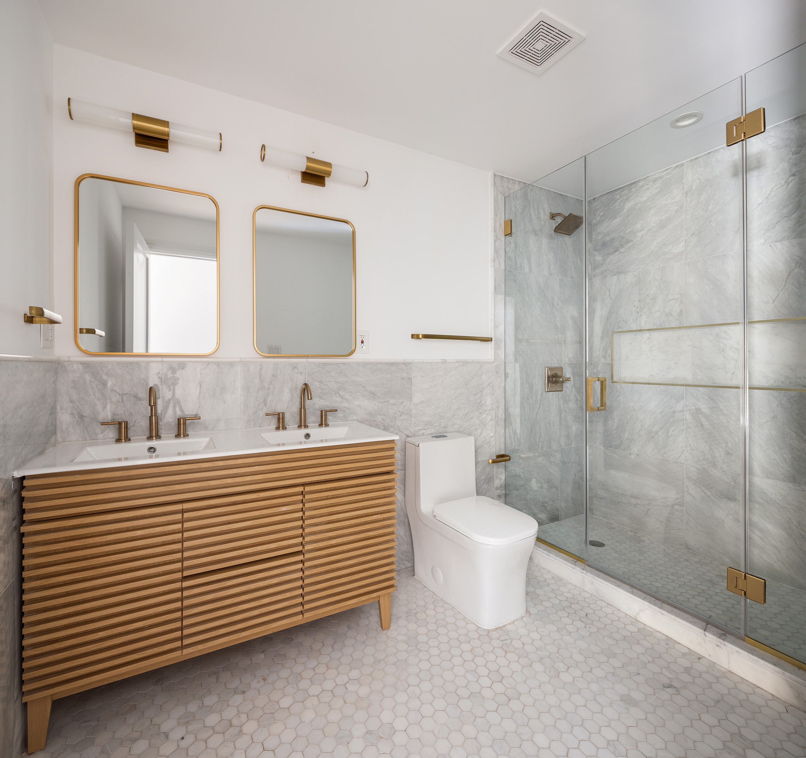698 Macon Street Brooklyn, NY 11233 - Photo 8 of 17 a bathroom with a toilet sink and mirror