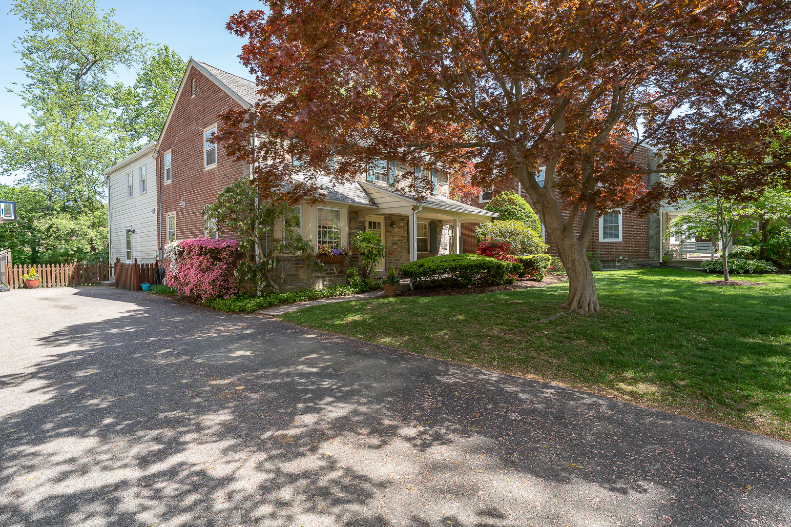 519 Mercer Road Merion Station, PA 19066 - Photo 4 of 58 a front view of a house with garden