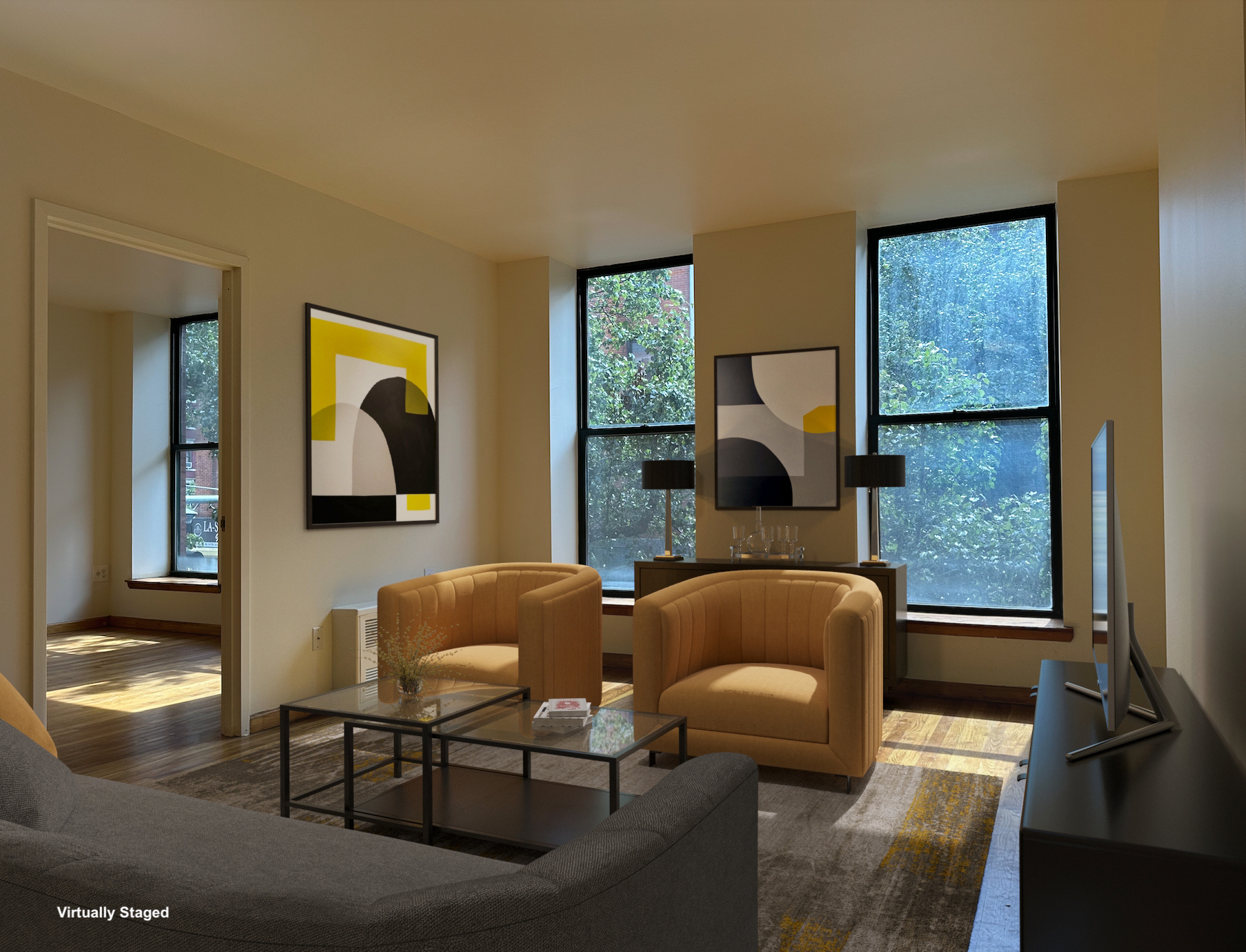 403 West 40th Street, Unit 2FE Manhattan, NY 10018 - Photo 1 of 12 a living room with furniture and a window