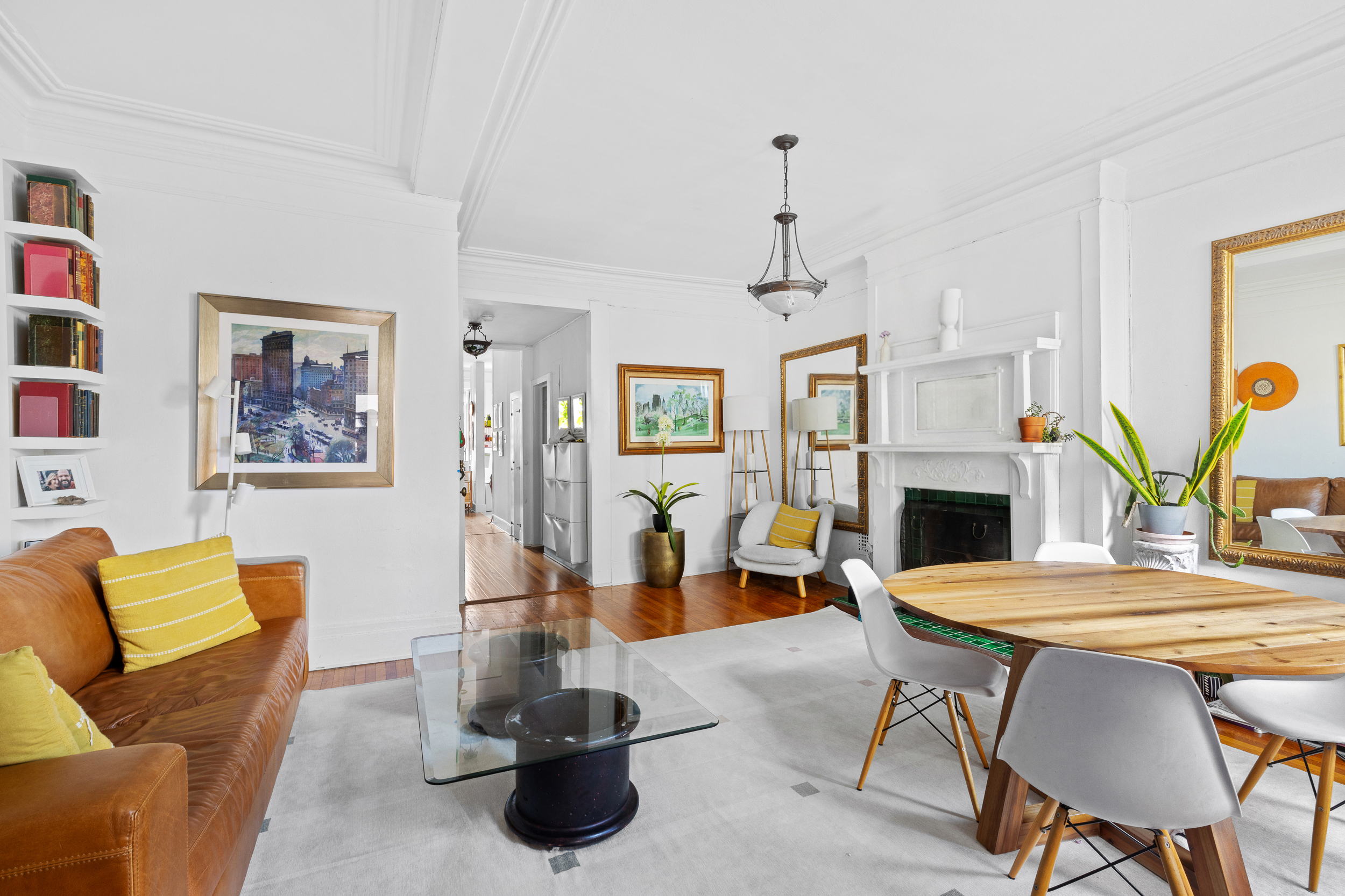 227 Garfield Place, Unit 2 Brooklyn, NY 11215 - Photo 2 of 15 a living room with furniture a fireplace and a table