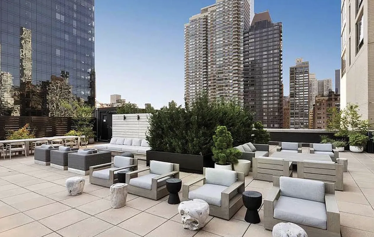 401 East 60th Street, Unit 4ABC Manhattan, NY 10022 - Photo 16 of 18 a outdoor space with lots of white furniture