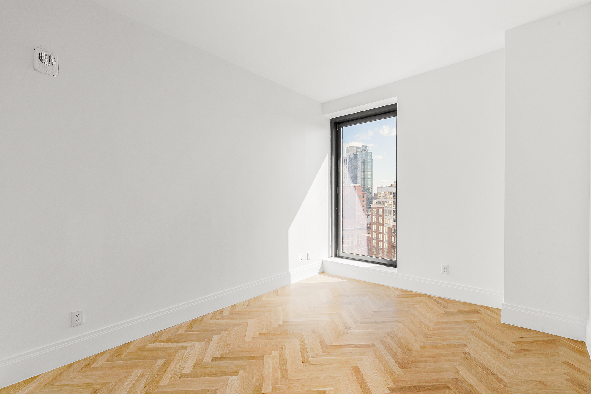 300 West 122nd Street, Unit 12C Manhattan, NY 10027 - Photo 7 of 11 a view of an empty room and window