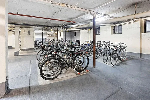 7101 Colonial Road, Unit R3E Brooklyn, NY 11209 - Photo 13 of 19 a view of a room with glass top table and chairs