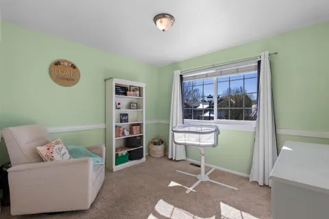 a room with furniture and window