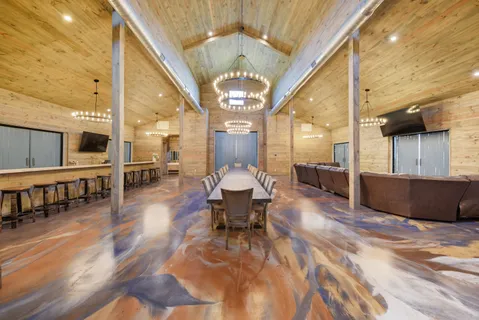 a view of a house with backyard and porch