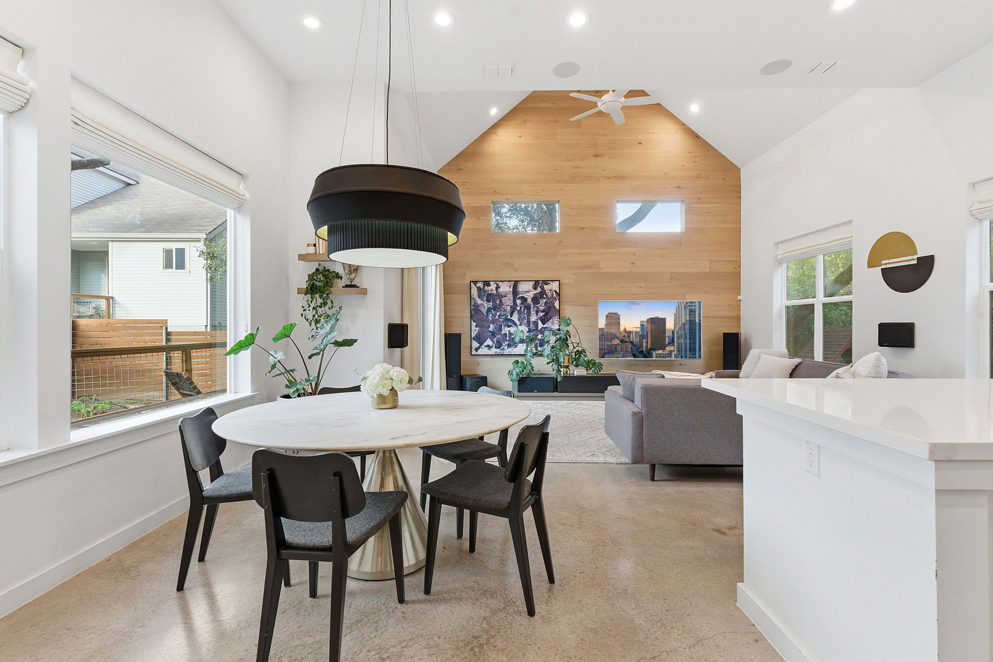 a dining room with a table and chairs