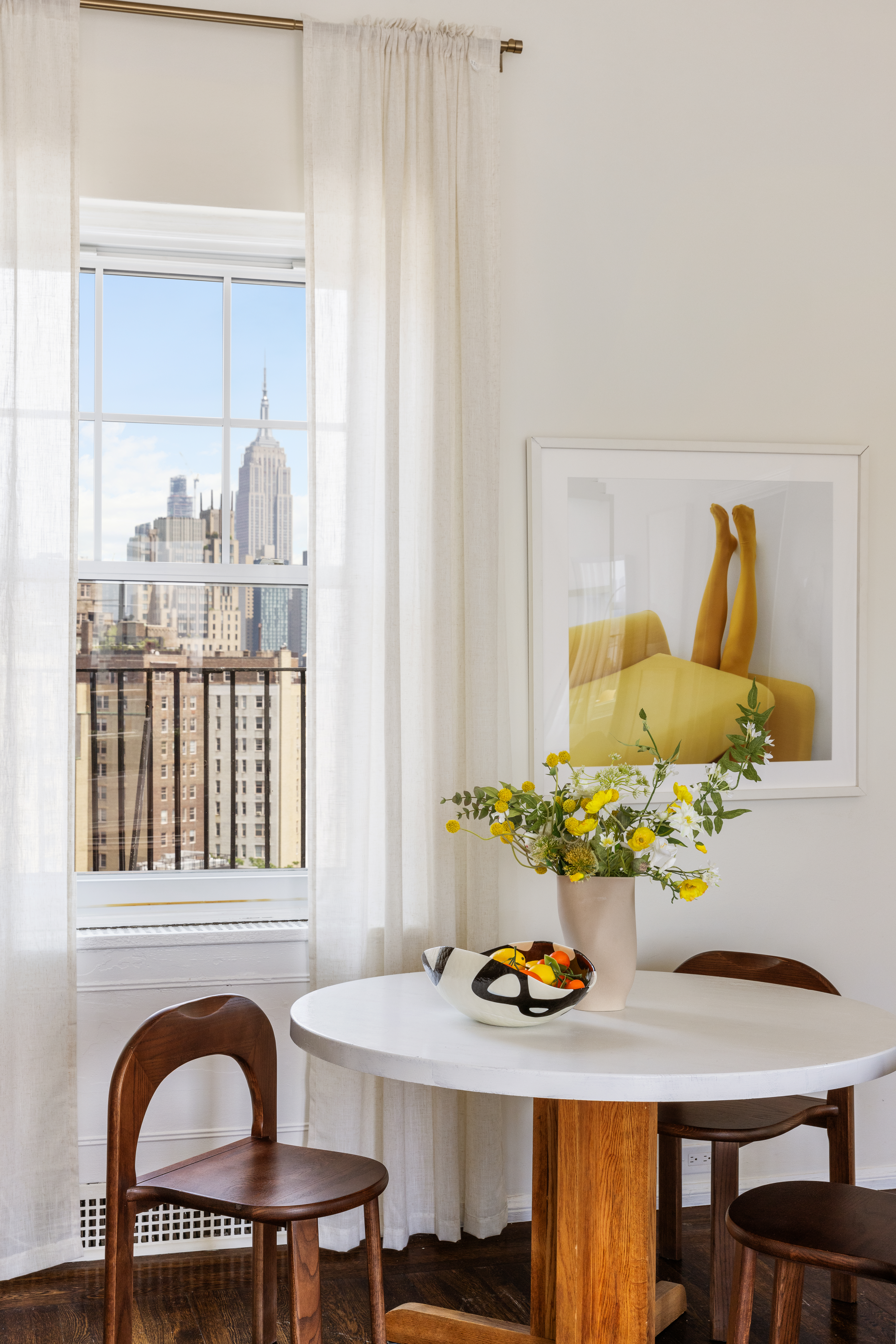 302 West 12th Street, Unit PHE Manhattan, NY 10014 - Photo 7 of 16 a view of a dining room with furniture and window
