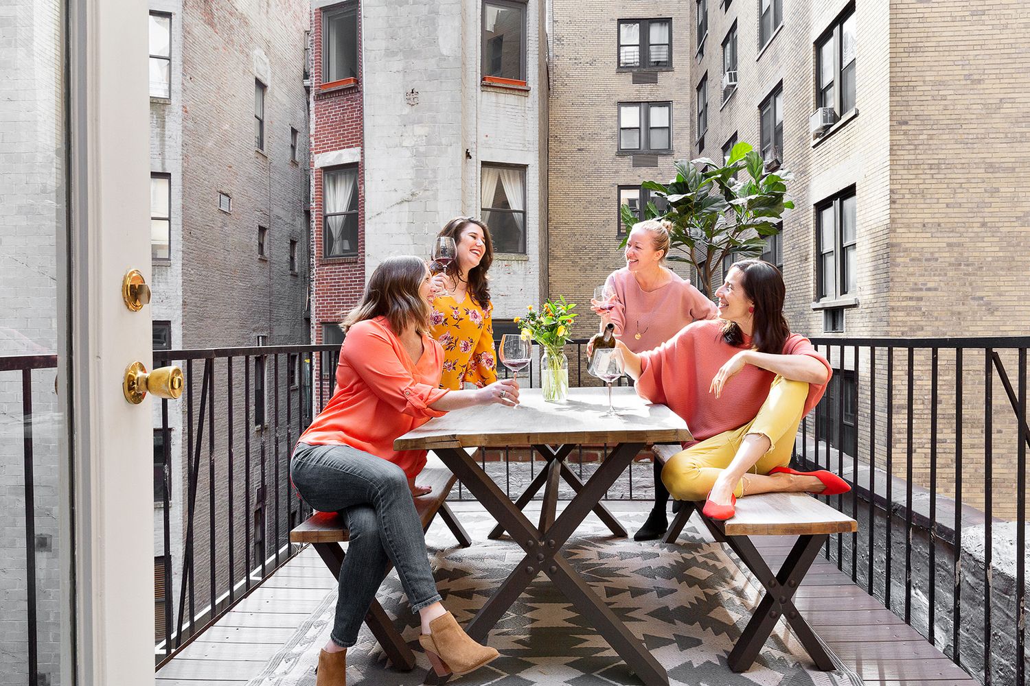 258 West 93rd Street, Unit 4AB Manhattan, NY 10025 - Photo 9 of 10 a backyard of a house with table and chairs