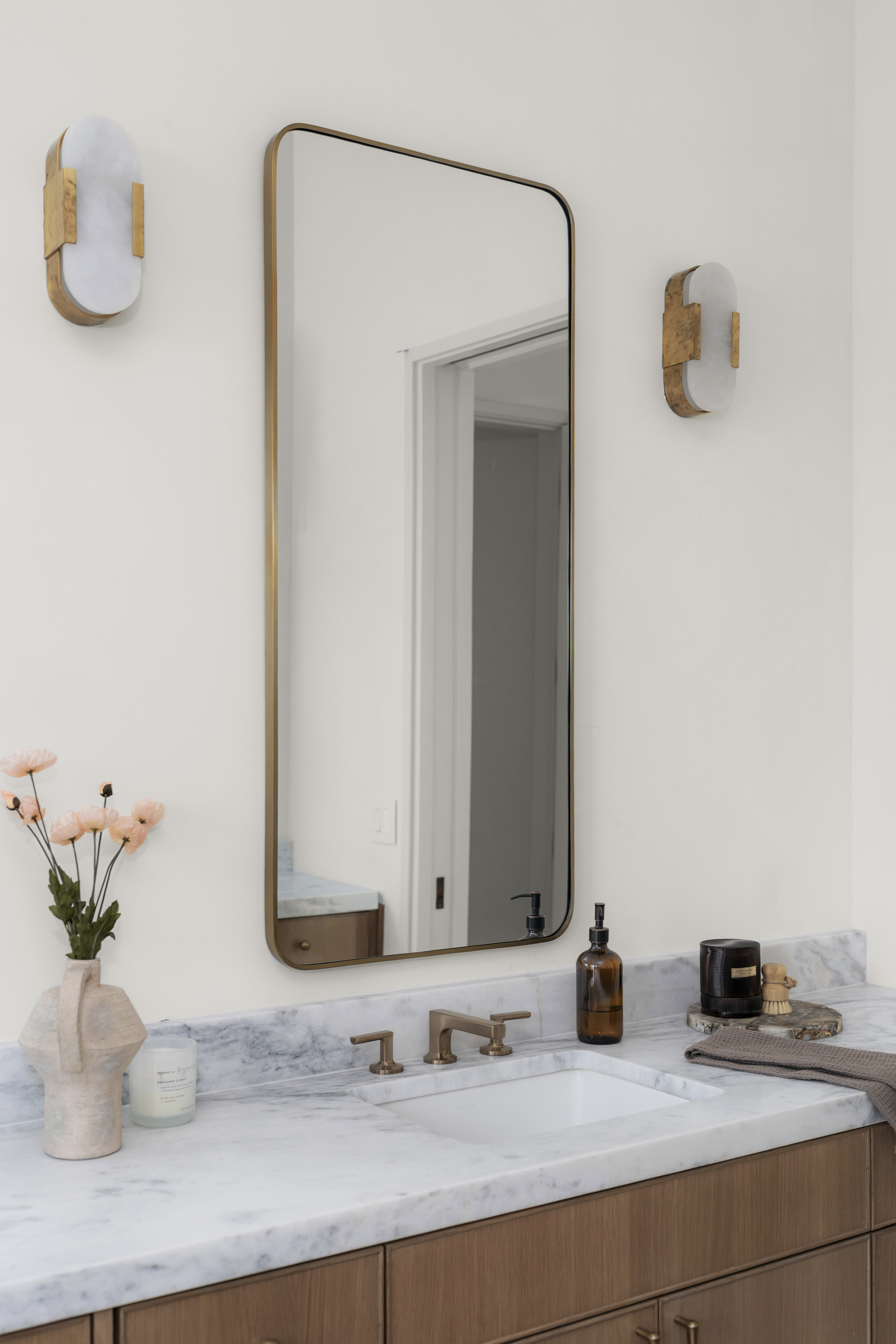 3411 Bridle Path Austin, TX 78703 - Photo 36 of 76 a bathroom with a sink and a mirror
