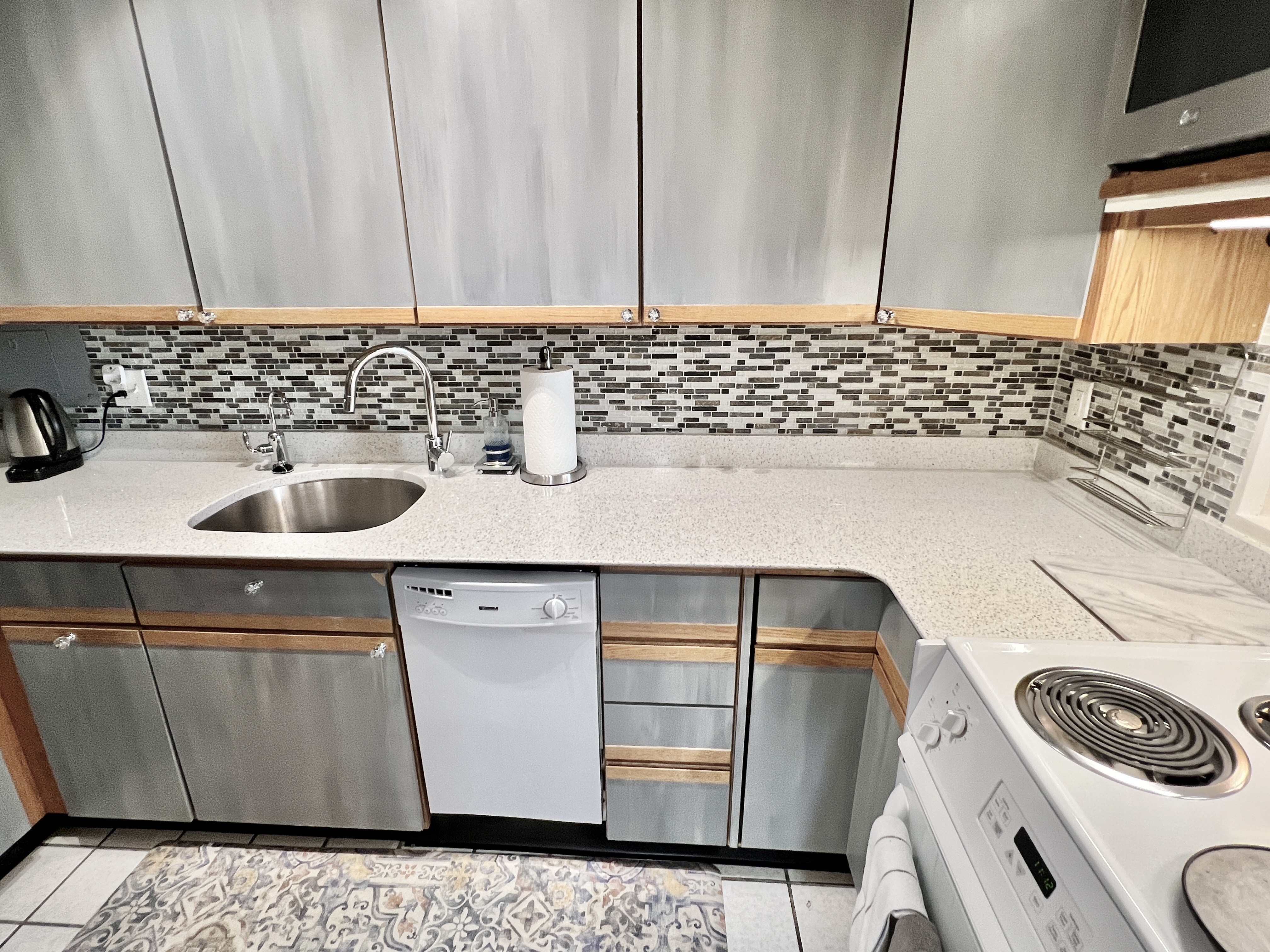 520 N Street Southwest, Unit S112 Washington, DC 20024 - Photo 18 of 40 a bathroom with a sink a toilet and vanity