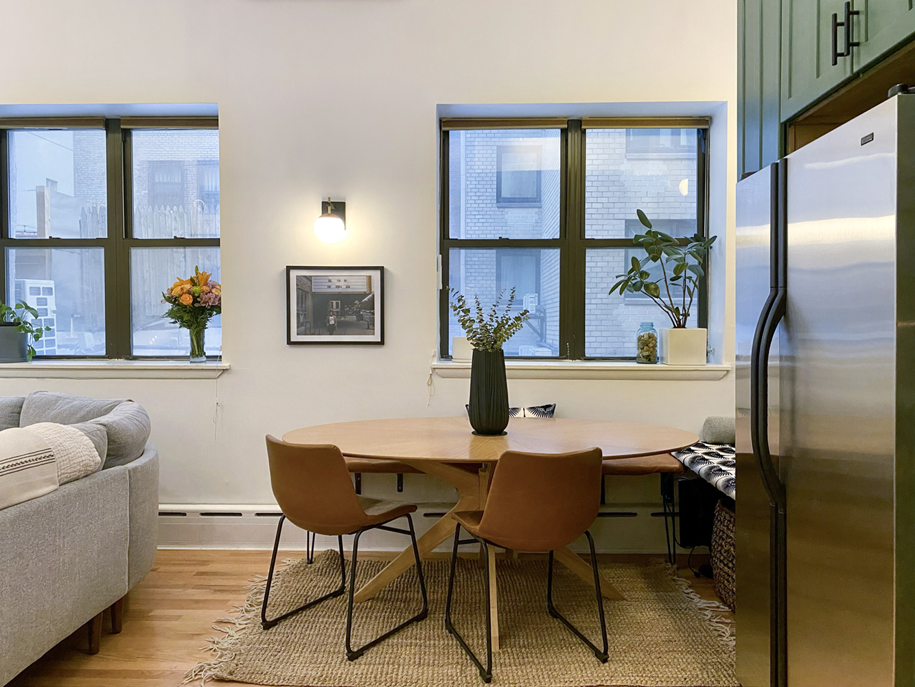 60 Court Street, Unit 2L Brooklyn, NY 11201 - Photo 5 of 9 a dining room with furniture and a floor to ceiling window