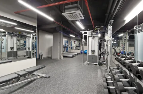 a view of a room with gym equipment
