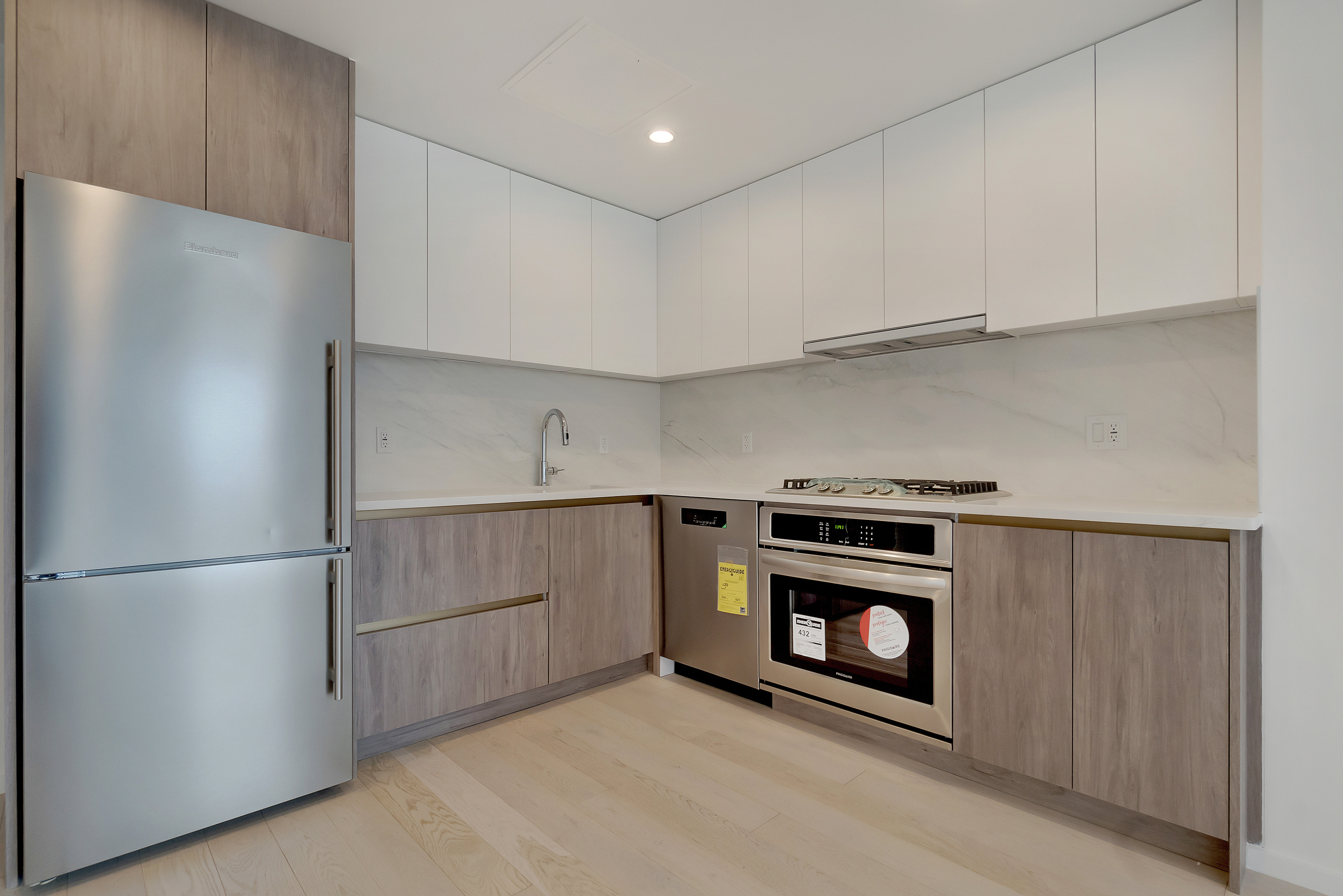 2286 Cropsey Avenue, Unit 6G Brooklyn, NY 11214 - Photo 2 of 22 a kitchen with cabinets and a refrigerator