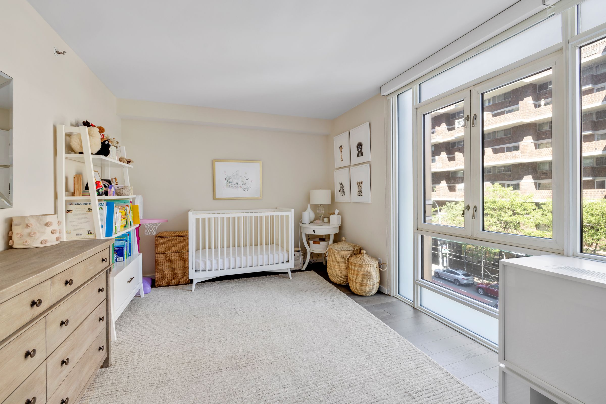 385 1st Avenue, Unit 4B Manhattan, NY 10010 - Photo 9 of 18 a bedroom with furniture and a window