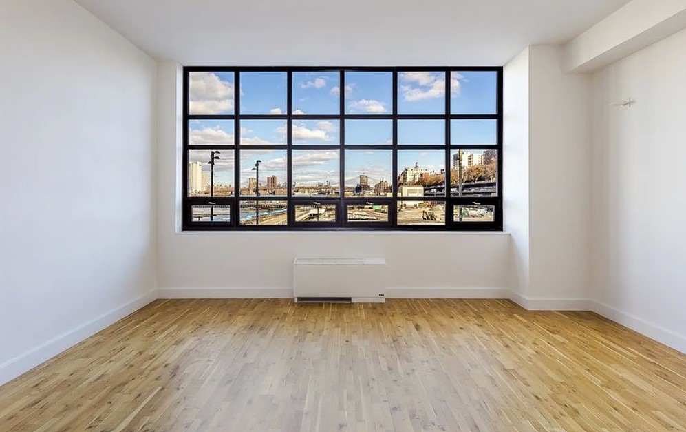 360 Furman Street, Unit 221 Brooklyn, NY 11201 - Photo 2 of 36 wooden floor with window