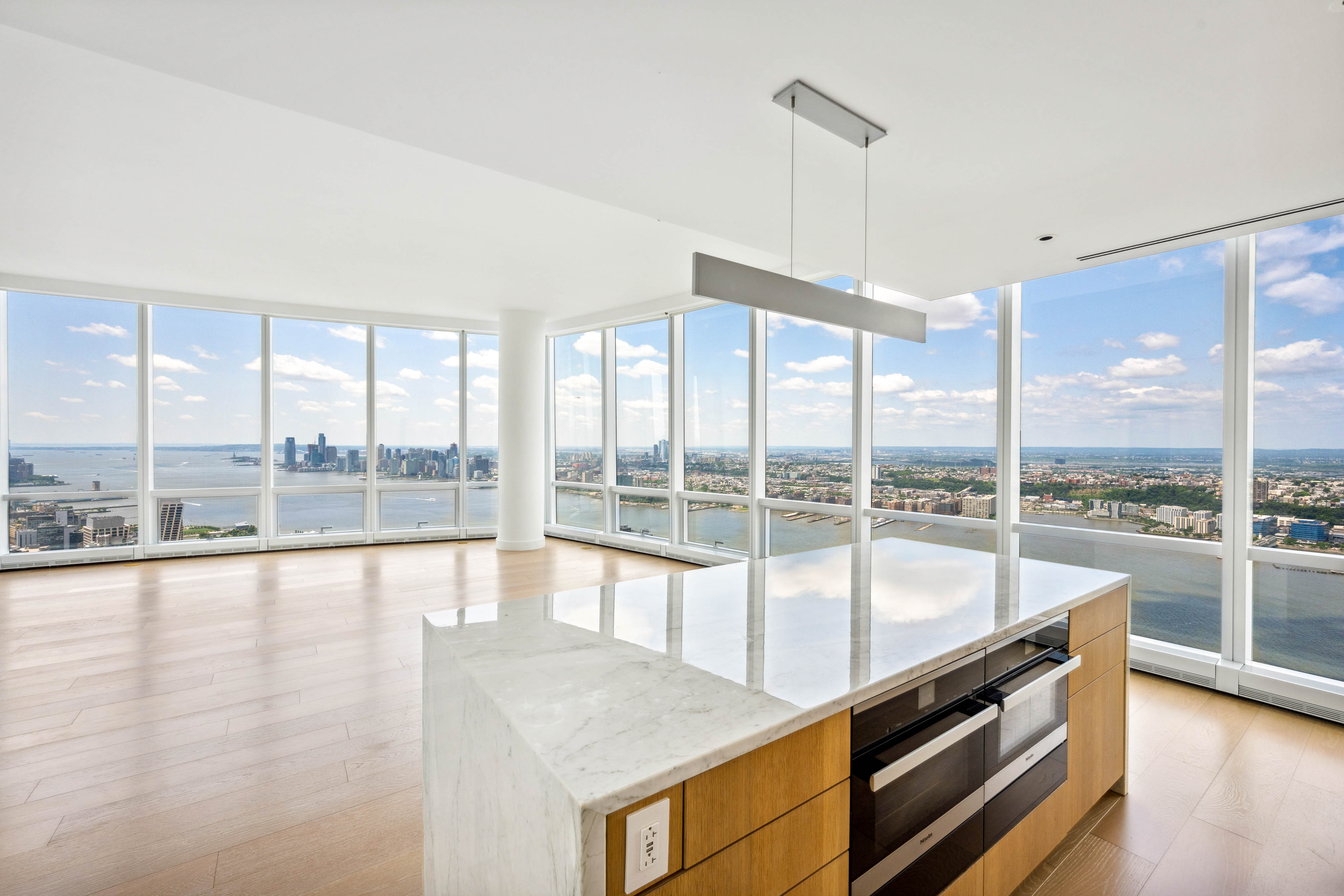 15 Hudson Yards, Unit 77B Manhattan, NY 10001 - Photo 3 of 24 a view of a living room with furniture