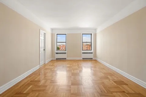 an empty room with windows