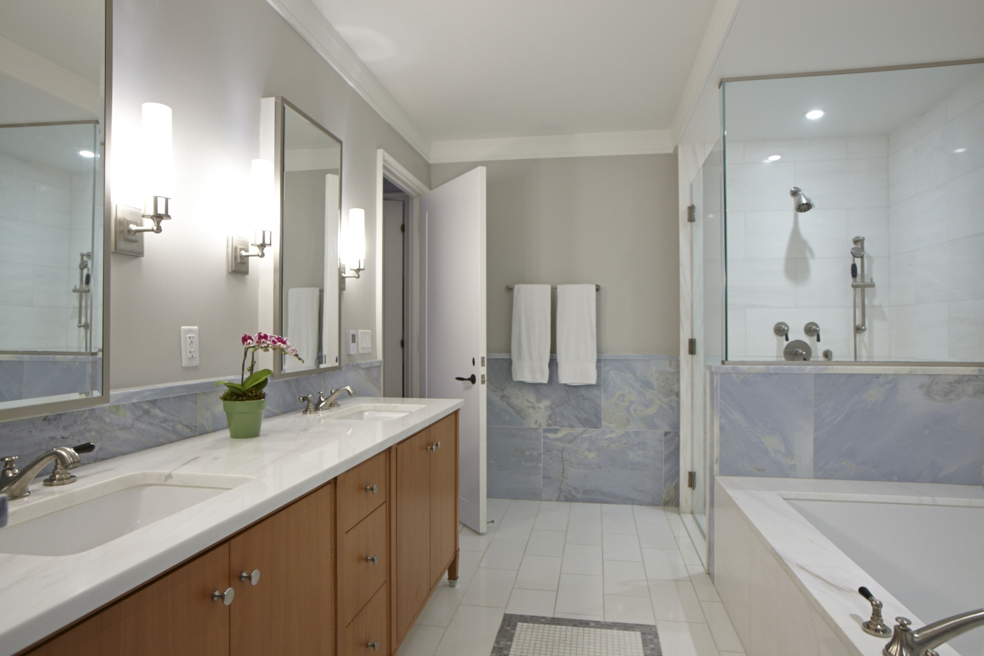2150 Broadway, Unit 9E Manhattan, NY 10023 - Photo 7 of 14 a bathroom with a granite countertop sink and a mirror