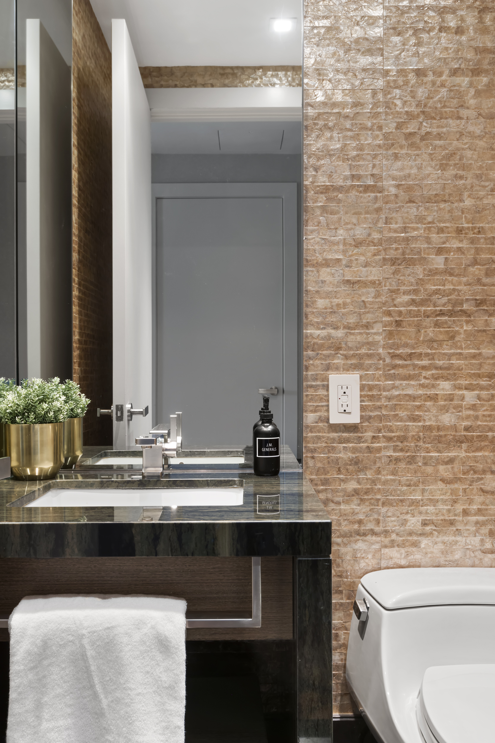 400 West 12th Street, Unit 4E Manhattan, NY 10014 - Photo 22 of 24 a bathroom with a sink and a toilet