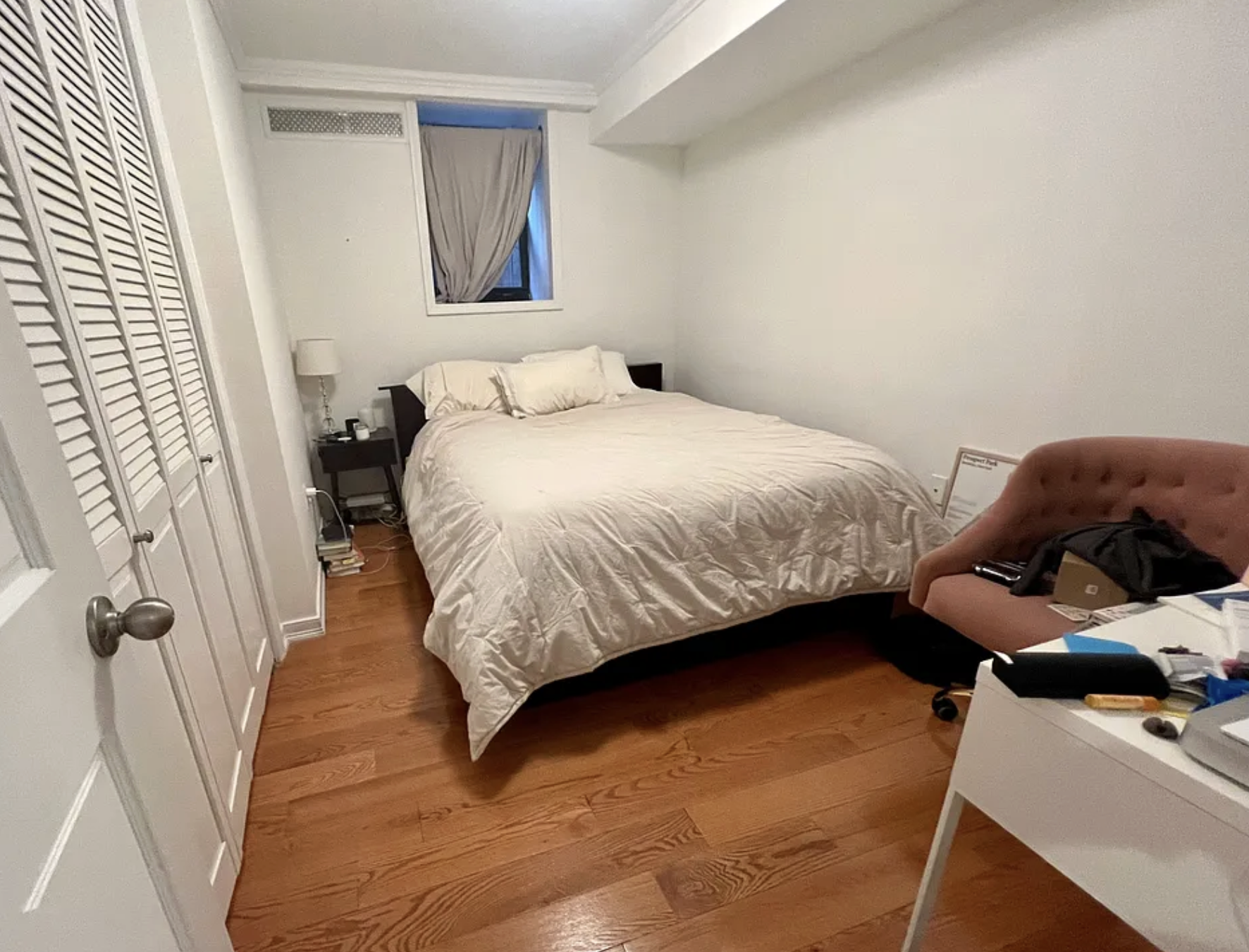 573 6th Street, Unit 3 Brooklyn, NY 11215 - Photo 12 of 19 a bedroom with a bed and window