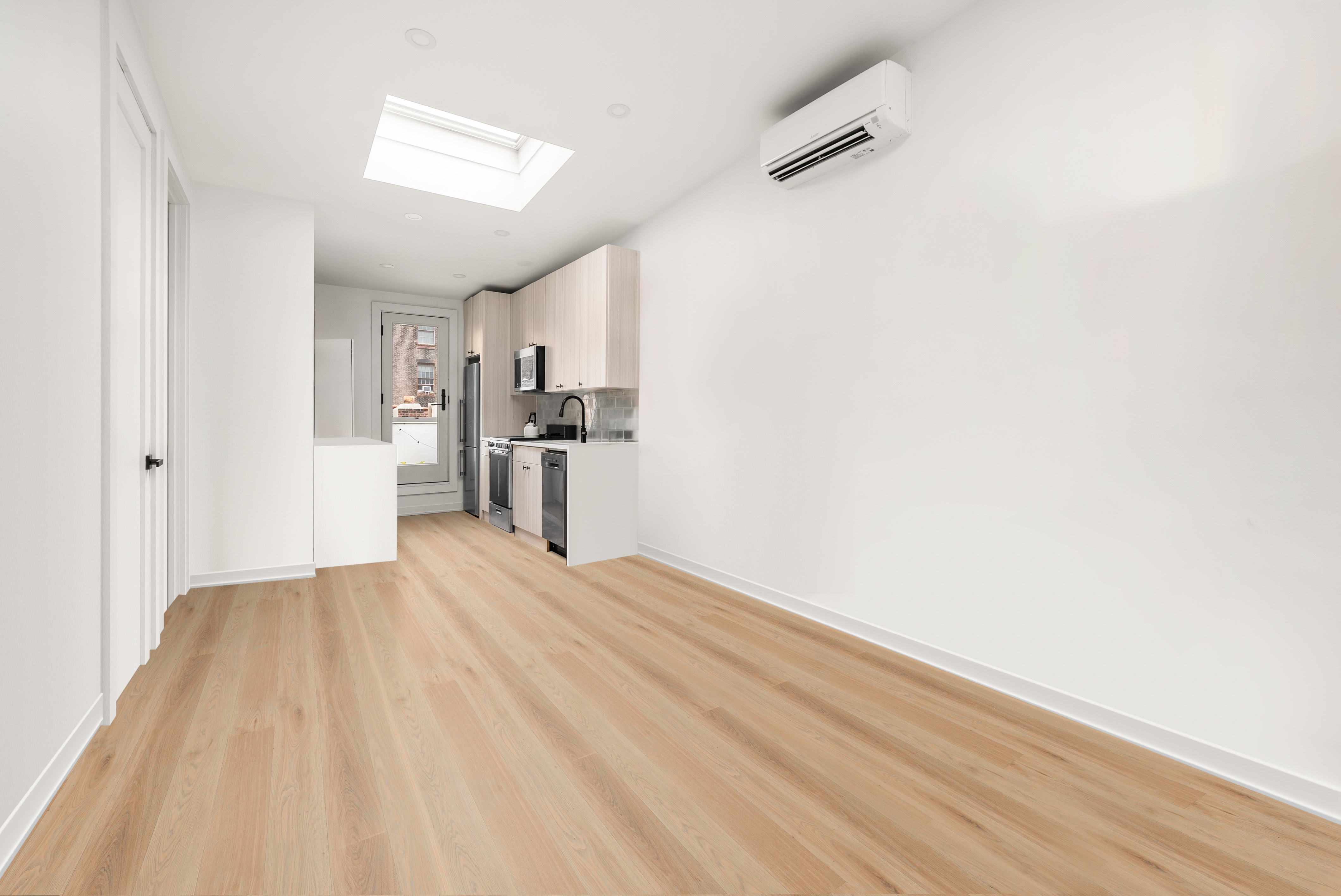 275 Bleecker Street, Unit 4 Manhattan, NY 10014 - Photo 2 of 10 a view of empty room with wooden floor