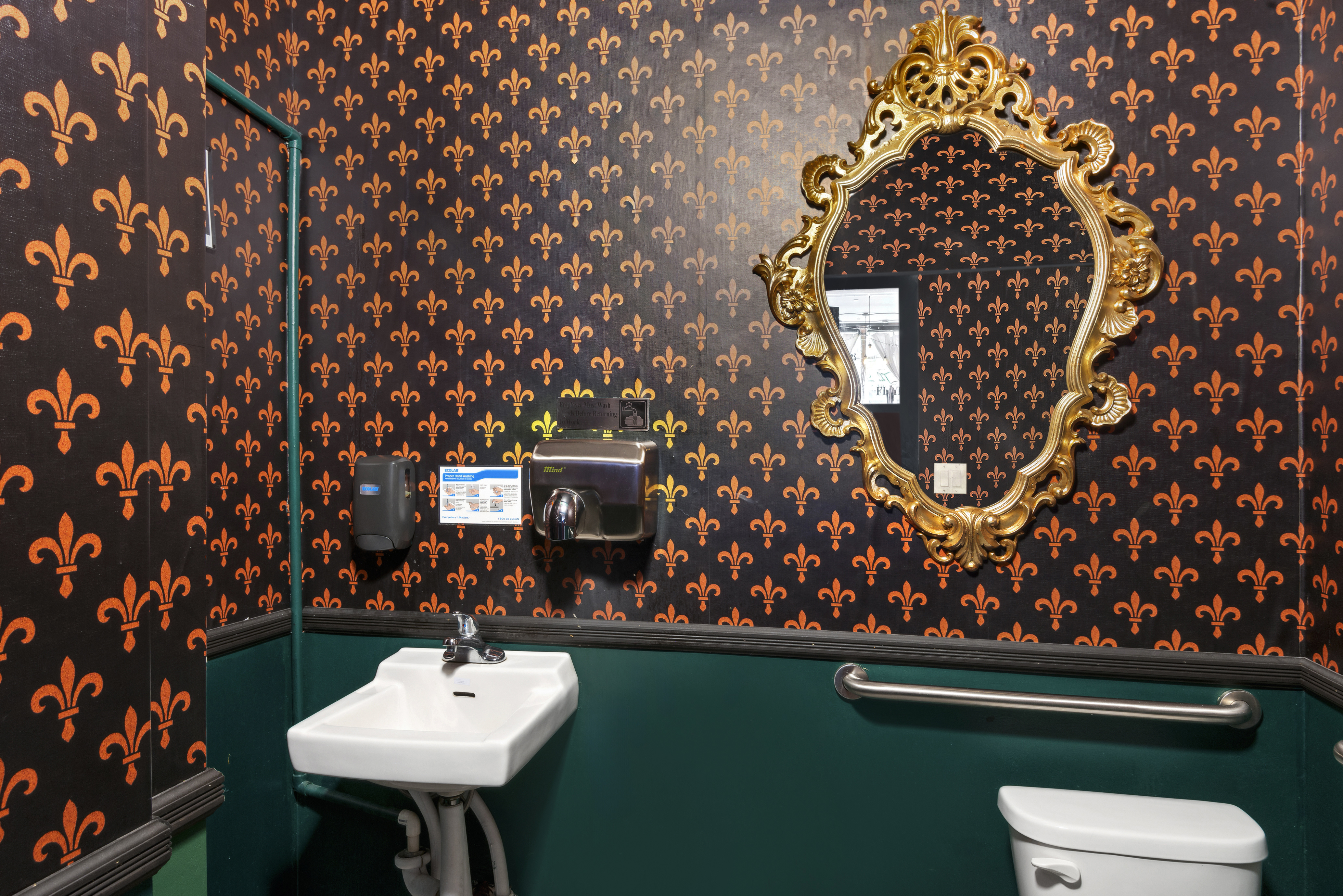 397 5th Avenue Brooklyn, NY 11215 - Photo 5 of 14 a bathroom with a sink toilet and a mirror