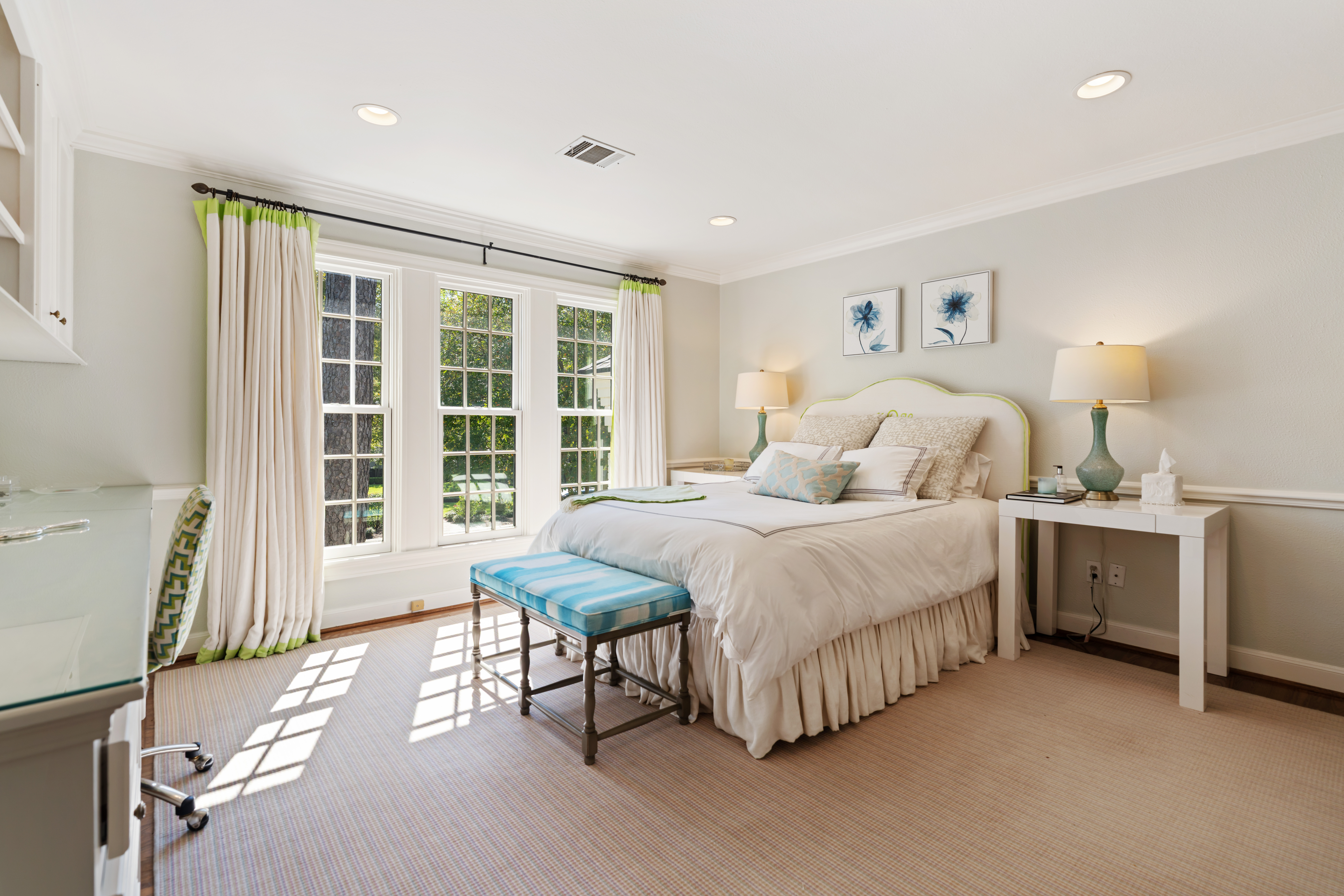 711 Pifer Road Houston, TX 77024 - Photo 39 of 53 a spacious bedroom with a bed and a table