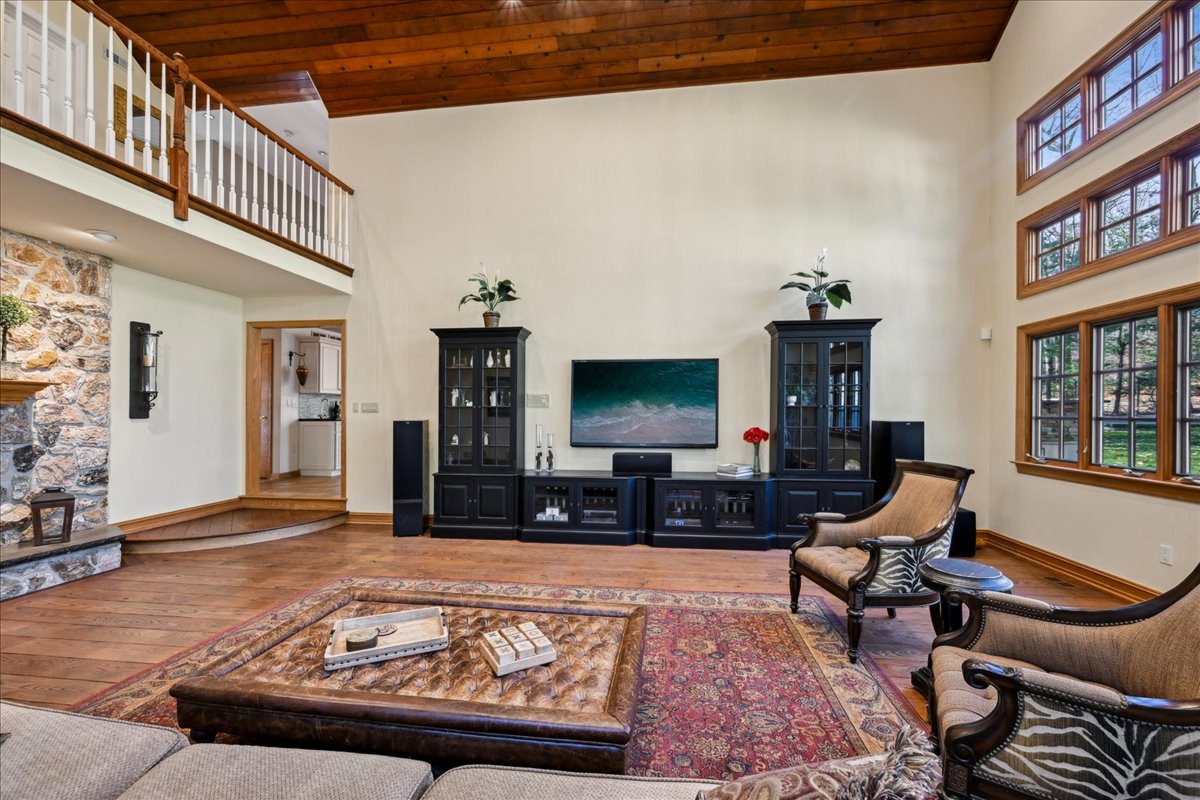 Johnston Drive Watchung, NJ 07069 - Photo 33 of 85 a living room with furniture and a flat screen tv