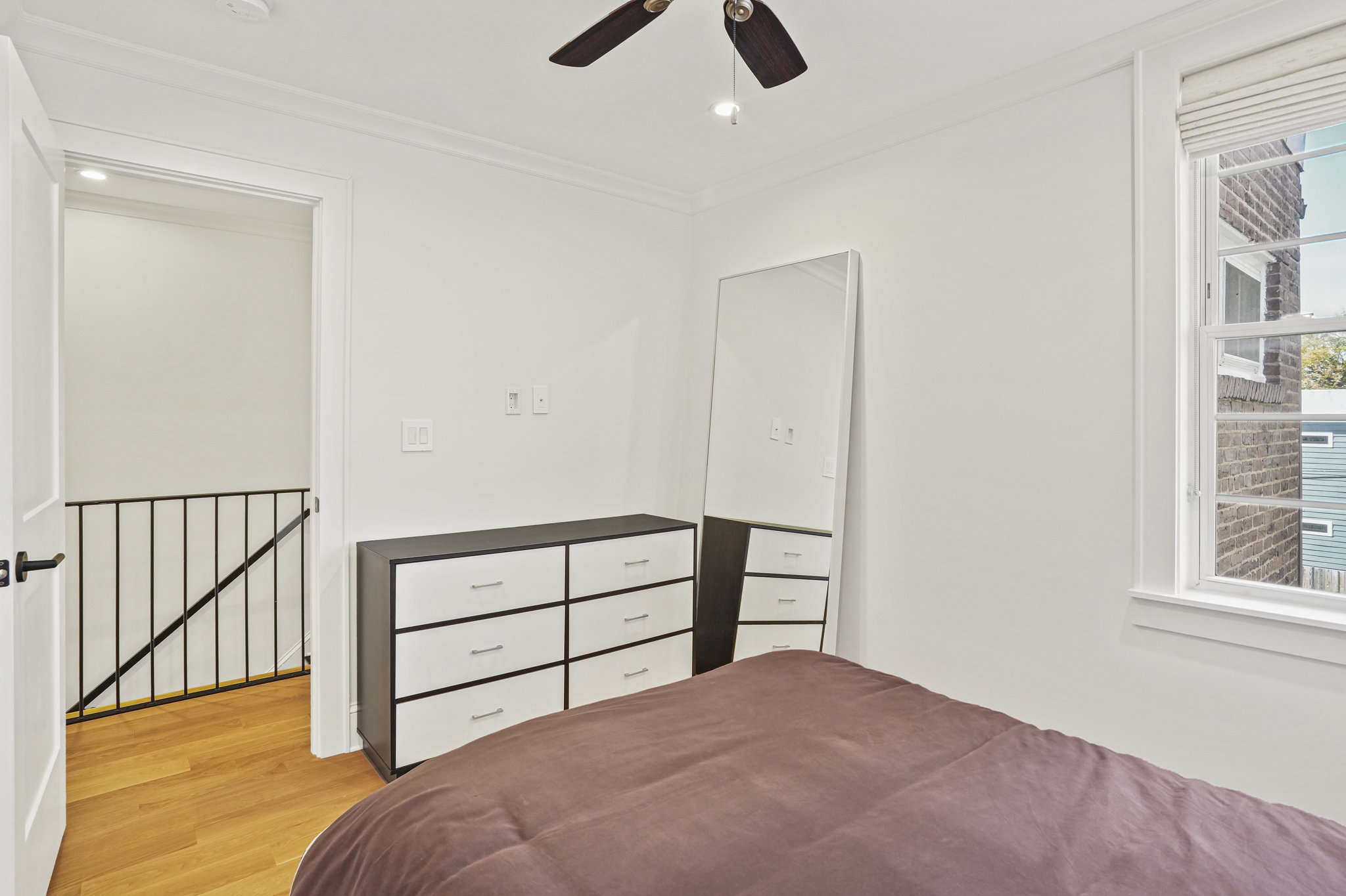 1920 35th Street Northwest Washington, DC 20007 - Photo 24 of 54 a view of bedroom and bedroom with wooden floor