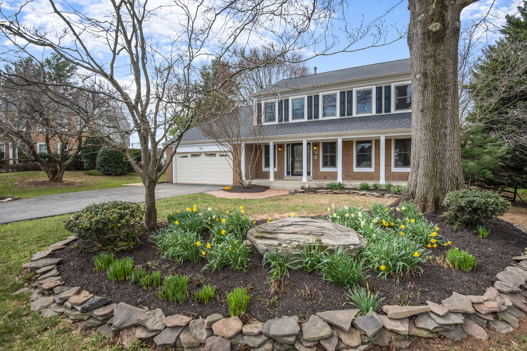 4008 Evangeline Terrace Olney, MD 20832 - Photo 4 of 54 a front view of a house with garden