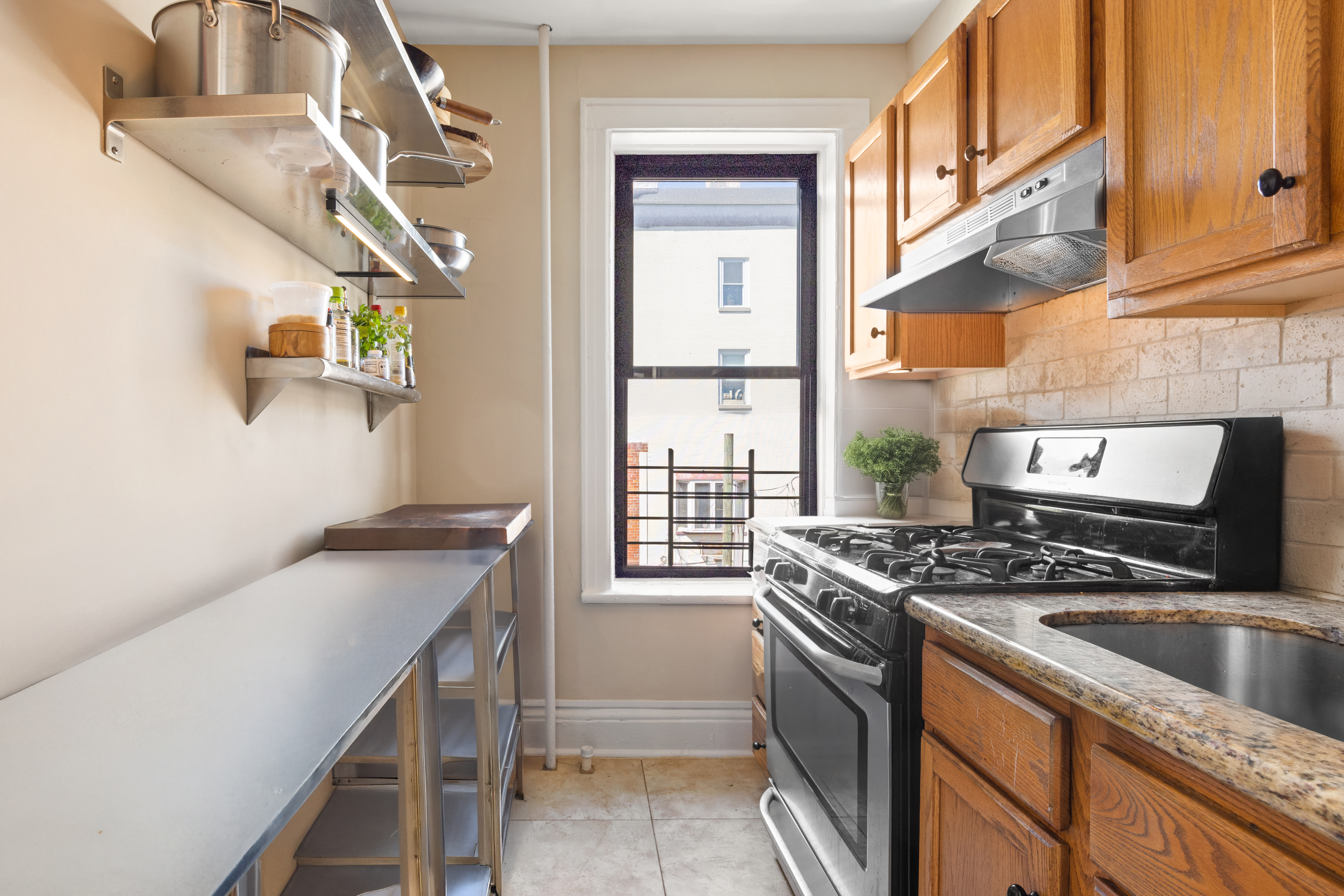 192-194 Union Street Brooklyn, NY 11231 - Photo 17 of 37 a kitchen that has a sink and a stove