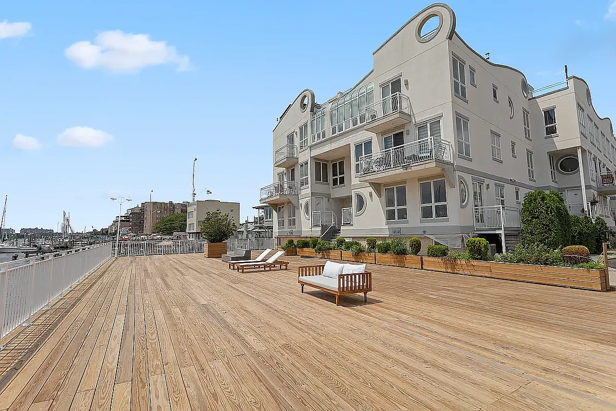 3112 Emmons Avenue, Unit 107 Brooklyn, NY 11235 - Photo 13 of 14 a view of a building with sitting area