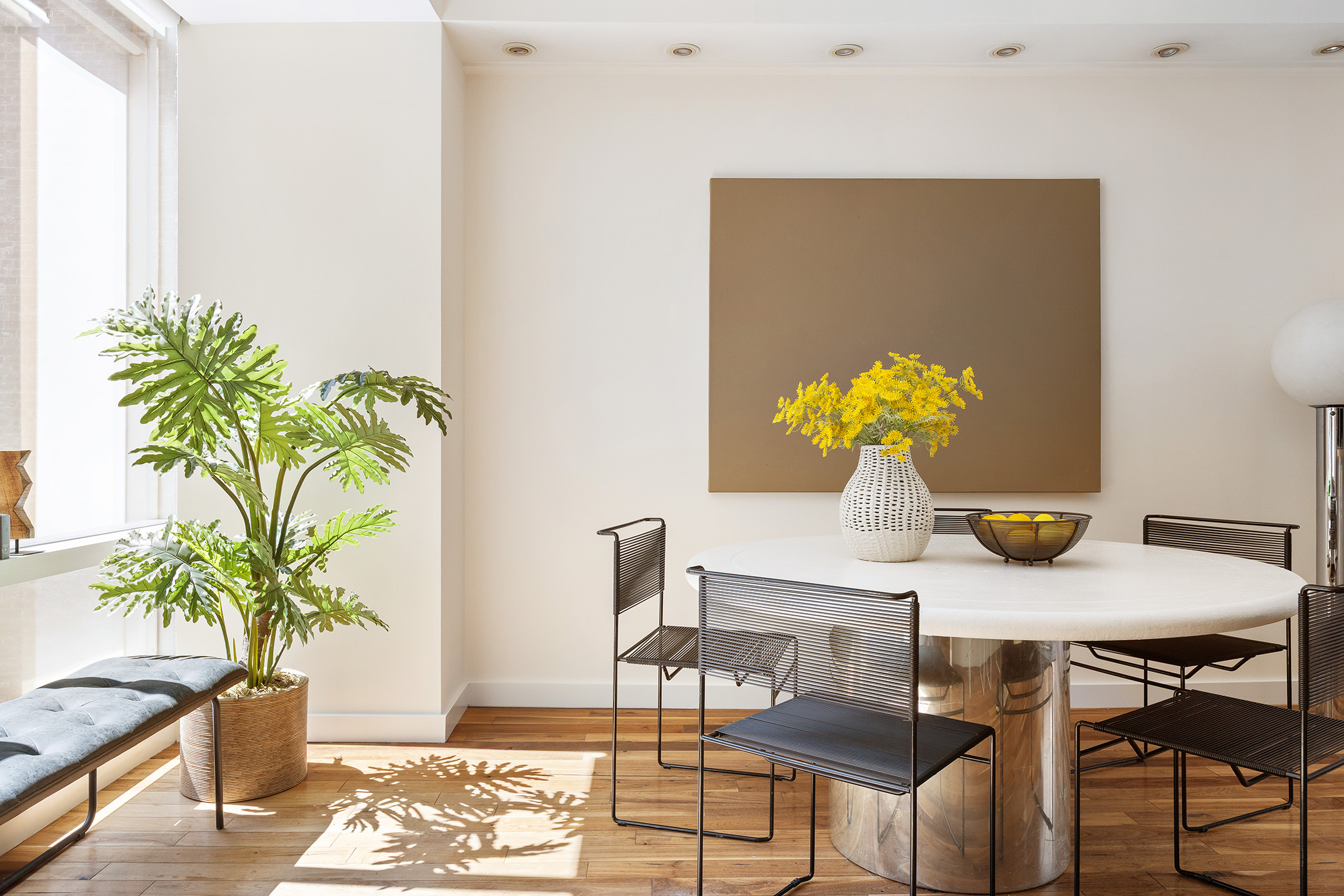 166 West 18th Street, Unit 4A Manhattan, NY 10011 - Photo 3 of 14 a view of a dining room with furniture and wooden floor
