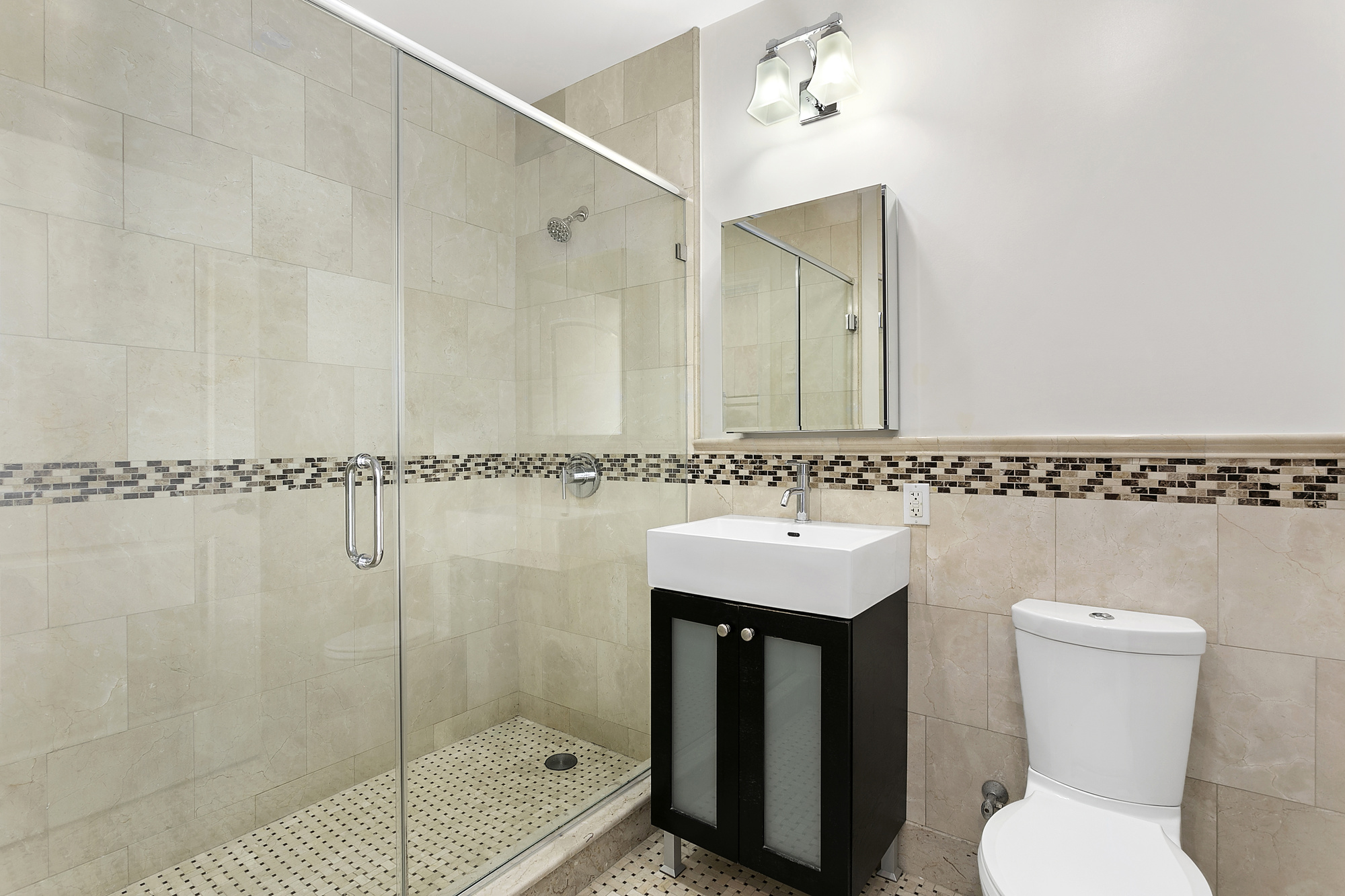 233 Pacific Street, Unit 3F Brooklyn, NY 11201 - Photo 4 of 11 a bathroom with a sink toilet and shower