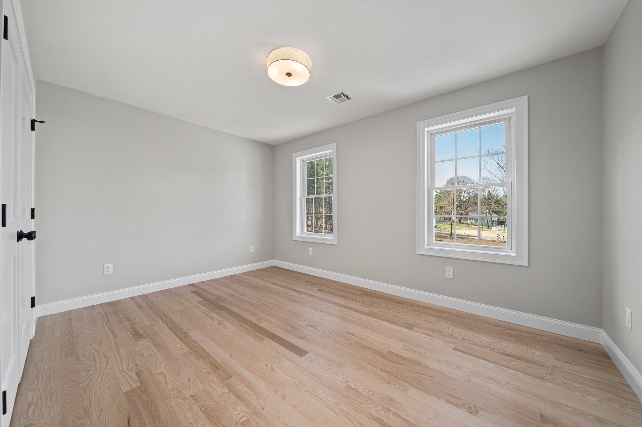 3 Everendon Road Canton, MA 02021 - Photo 29 of 35 a view of an empty room with wooden floor and a window