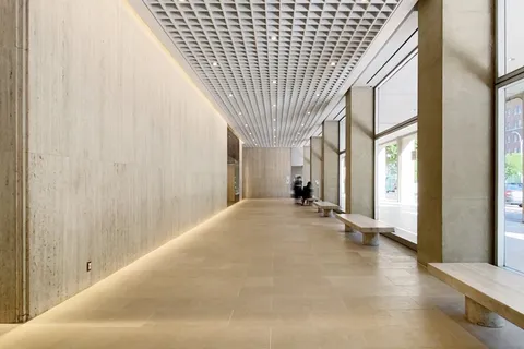 a room with gym equipment and mirrors