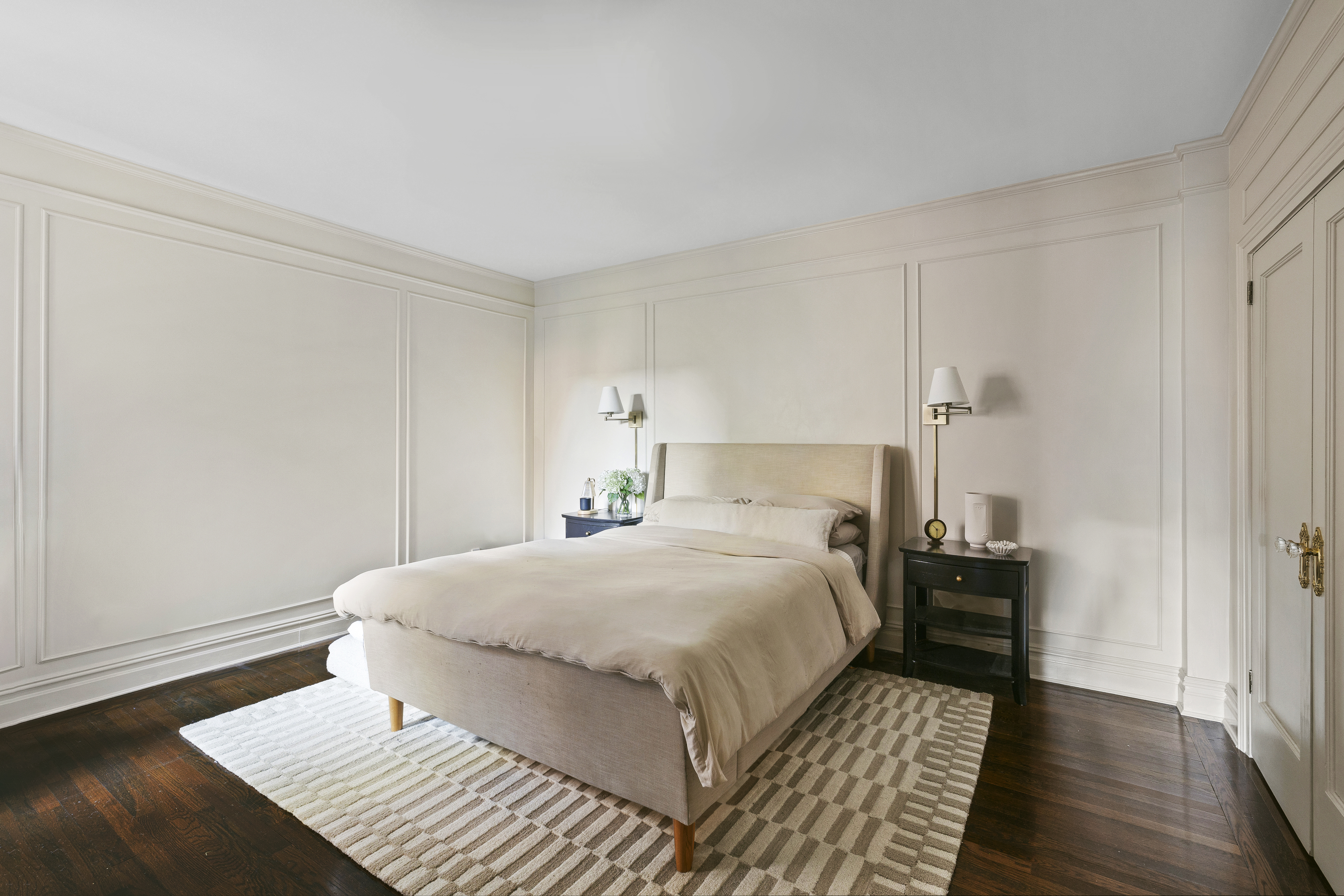 125 Ocean Avenue, Unit 2G Brooklyn, NY 11225 - Photo 9 of 16 a bedroom with a bed and wooden floor