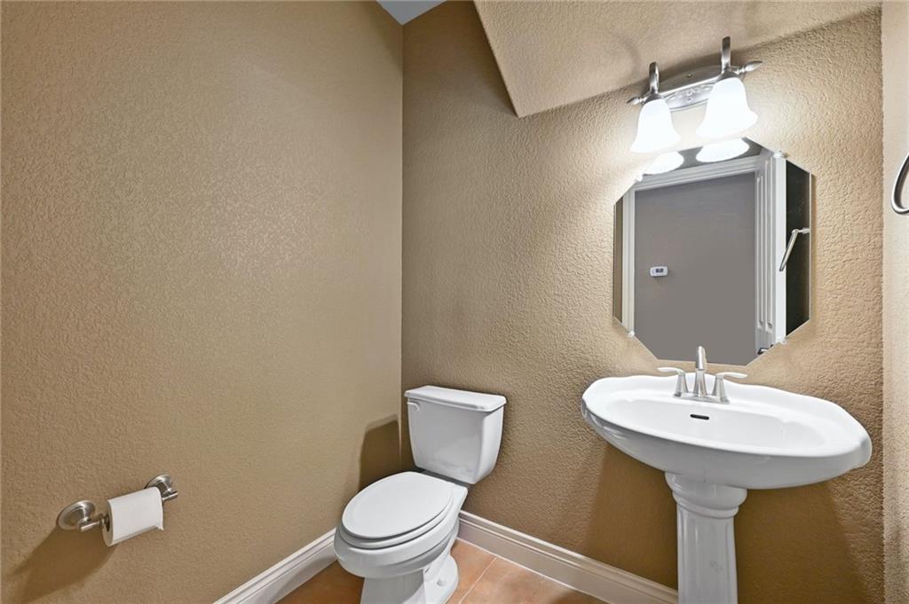1102 Clermont Avenue Austin, TX 78702 - Photo 17 of 30 a bathroom with a sink toilet and a mirror