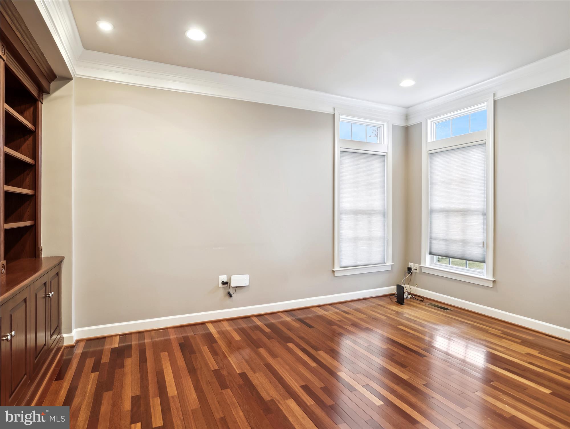 14302 Derby Ridge Road Bowie, MD 20721 - Photo 25 of 67 a view of an empty room with wooden floor and a window