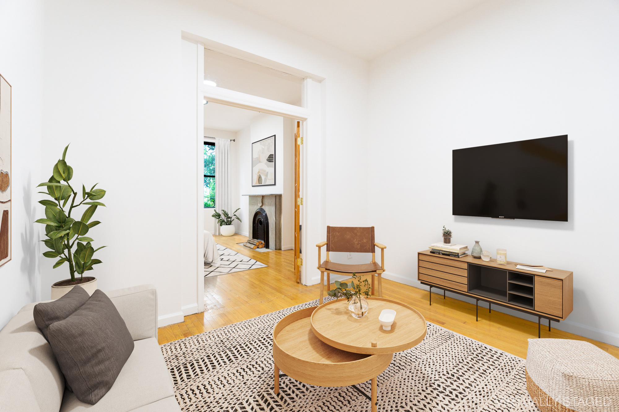 215 East 5th Street, Unit 3 Manhattan, NY 10003 - Photo 5 of 25 a living room with furniture and a flat screen tv
